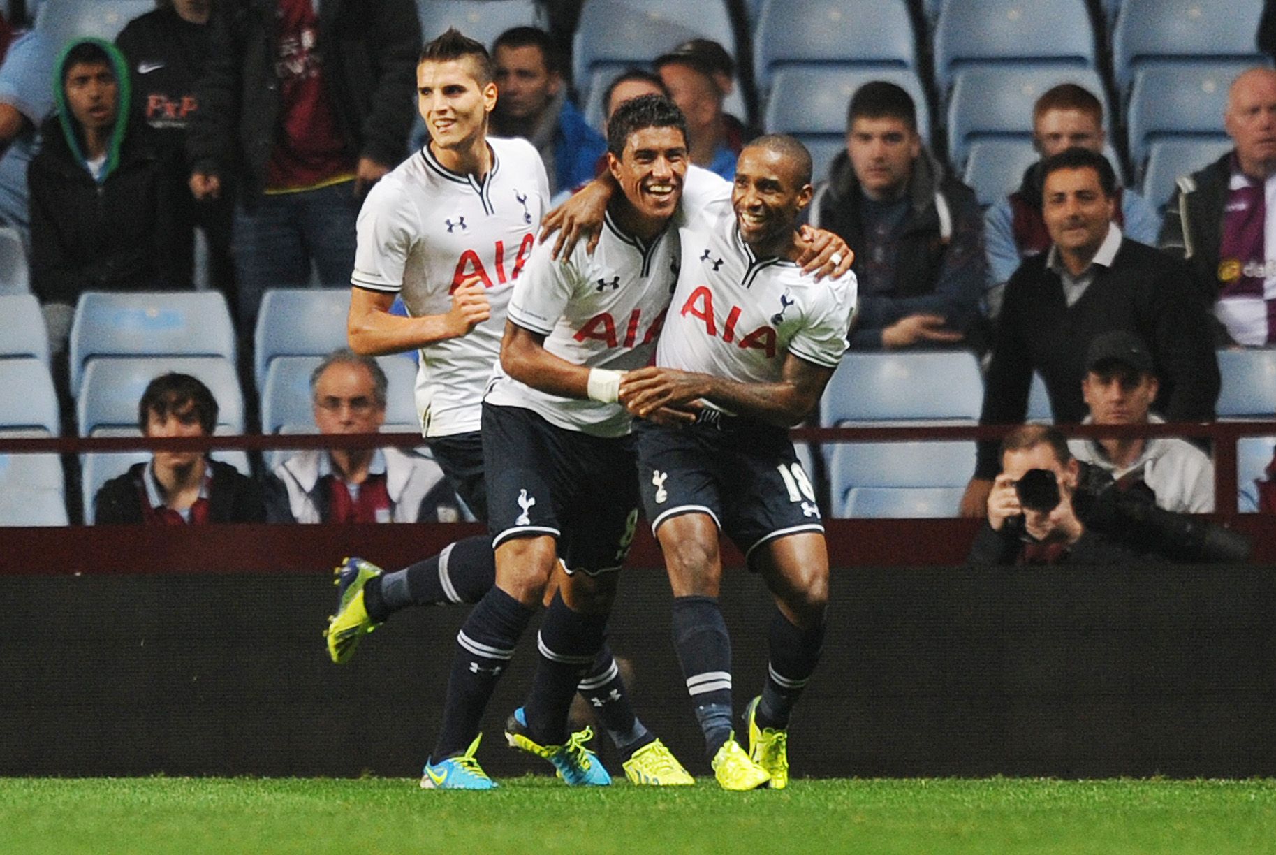 Football - Aston Villa v Tottenham Hotspur - Capital One Cup Third Round - Villa Park - 24/9/13 
Tottenham's Jermain Defoe (R) celebrates with  Paulinho (C) and Erik Lamela after scoring the first goal for his side 
Mandatory Credit: Action Images / Alex Morton 
Livepic 
EDITORIAL USE ONLY. No use with unauthorized audio, video, data, fixture lists, club/league logos or live services. Online in-match use limited to 45 images, no video emulation. No use in betting, games or single club/league/pla