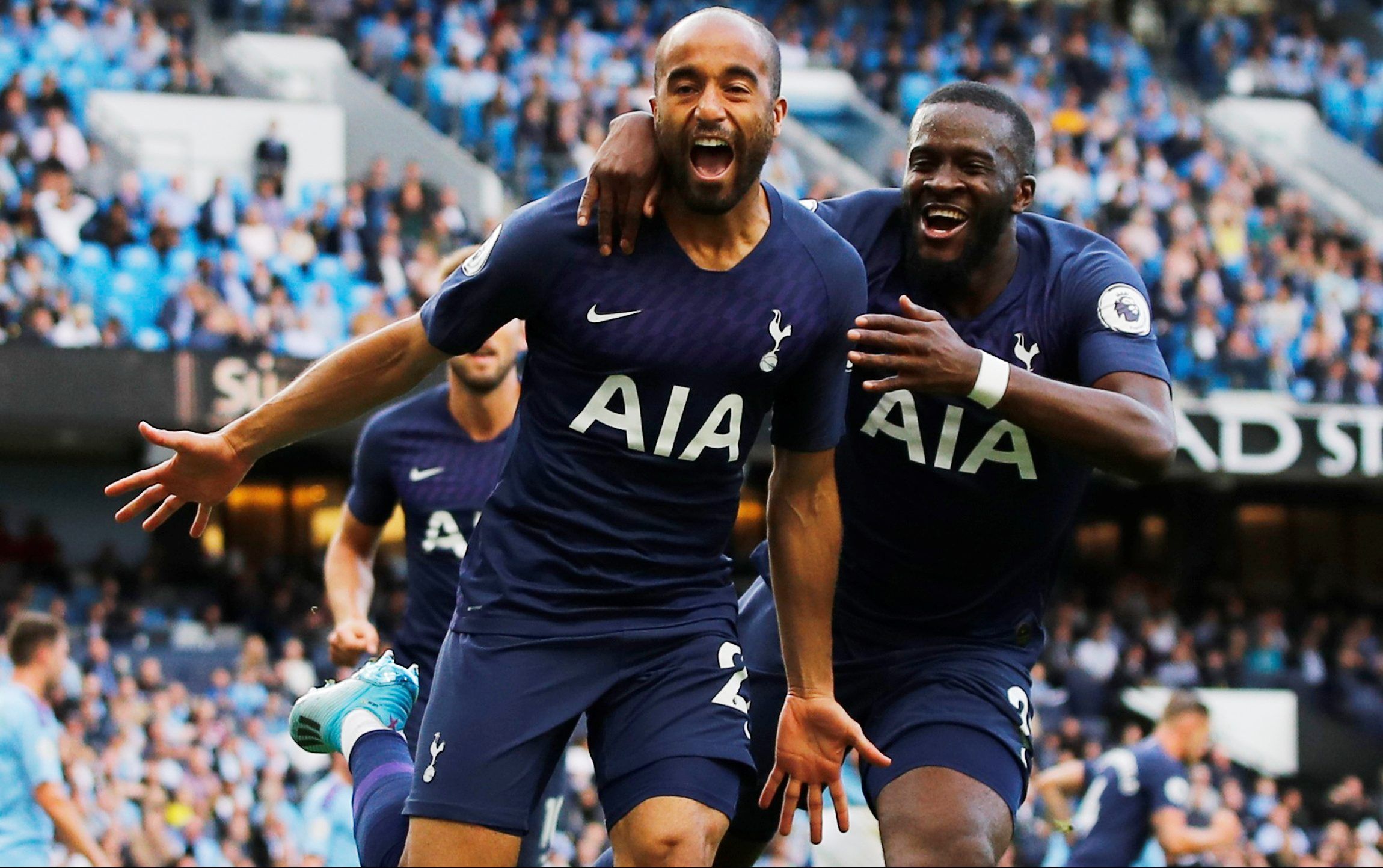Soccer Football - Premier League - Manchester City v Tottenham Hotspur - Etihad Stadium, Manchester, Britain - August 17, 2019  Tottenham Hotspur's Lucas Moura celebrates scoring their second goal with Tanguy Ndombele   REUTERS/Phil Noble  EDITORIAL USE ONLY. No use with unauthorized audio, video, data, fixture lists, club/league logos or 