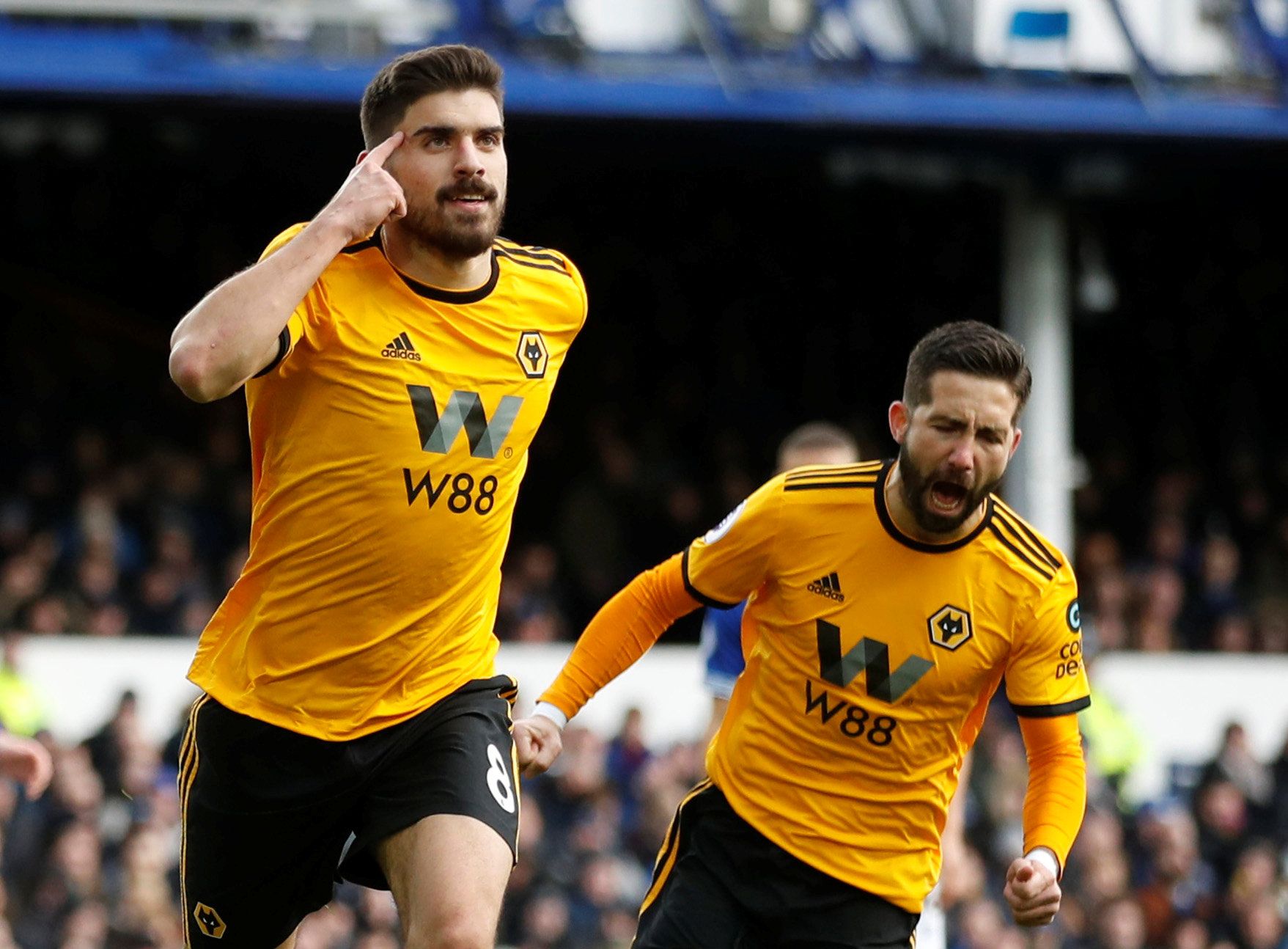 Soccer Football - Premier League - Everton v Wolverhampton Wanderers - Goodison Park, Liverpool, Britain - February 2, 2019  Wolverhampton Wanderers' Ruben Neves celebrates scoring their first goal with Joao Moutinho   Action Images via Reuters/Carl Recine  EDITORIAL USE ONLY. No use with unauthorized audio, video, data, fixture lists, club/league logos or 