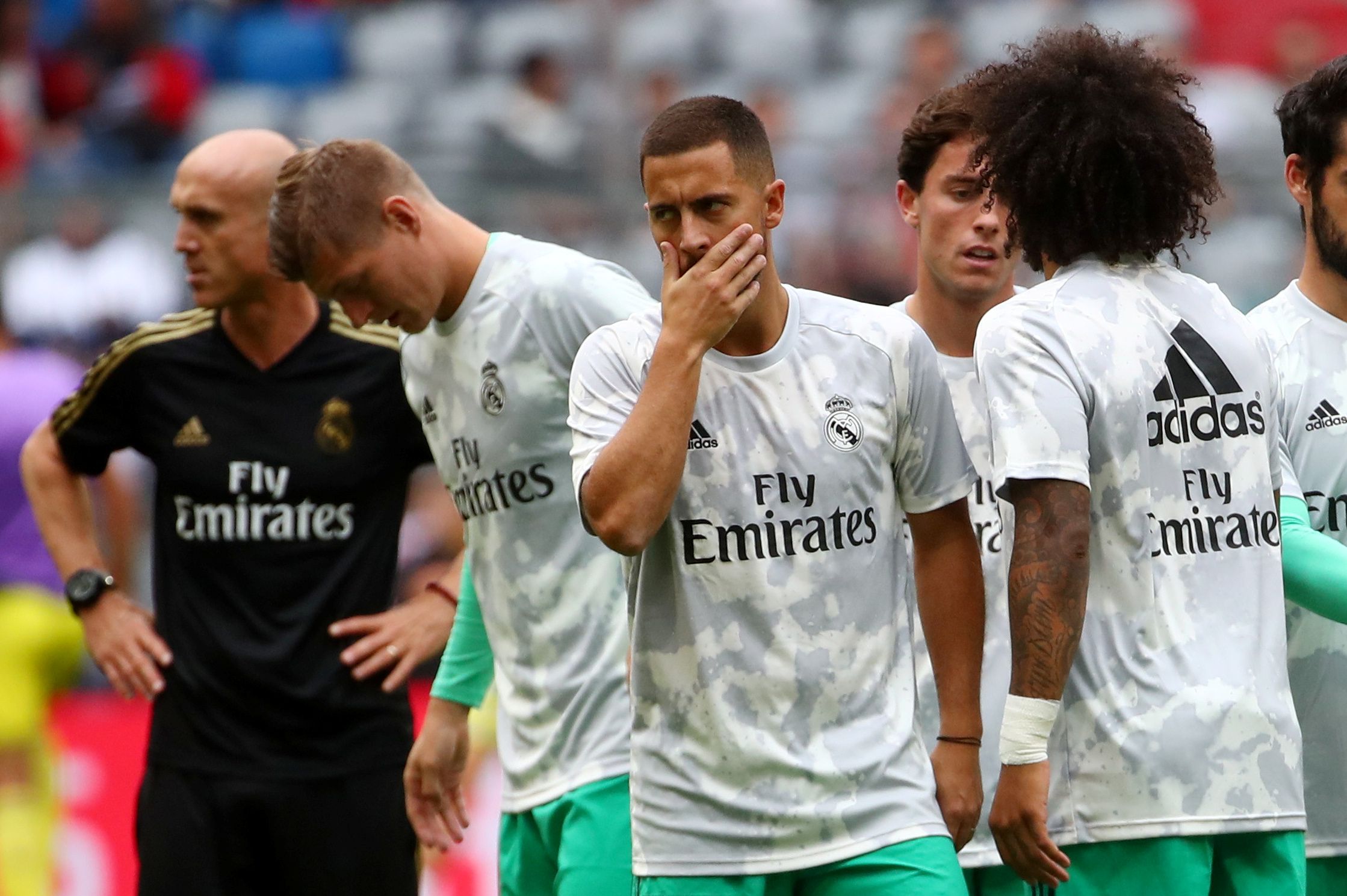 Soccer Football - Audi Cup - Third Place Play Off - Real Madrid v Fenerbahce - Allianz Arena, Munich, Germany - July 31, 2019  Real Madrid's Eden Hazard with team mates during the warm up before the match   REUTERS/Michael Dalder
