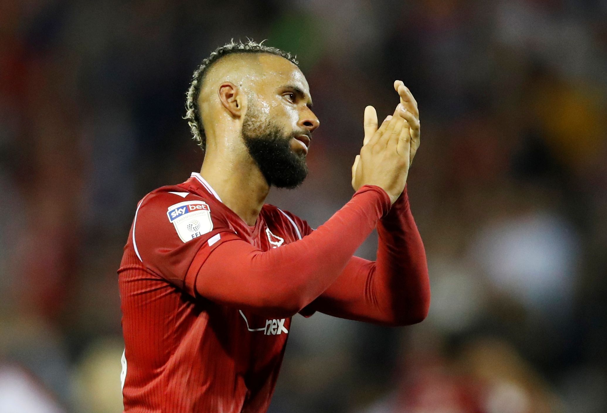 Soccer Football - Carabao Cup Second Round - Nottingham Forest v Derby County - The City Ground, Nottingham, Britain - August 27, 2019  Nottingham Forest's John Bostock applauds fans after the match          Action Images/Andrew Boyers  EDITORIAL USE ONLY. No use with unauthorized audio, video, data, fixture lists, club/league logos or 
