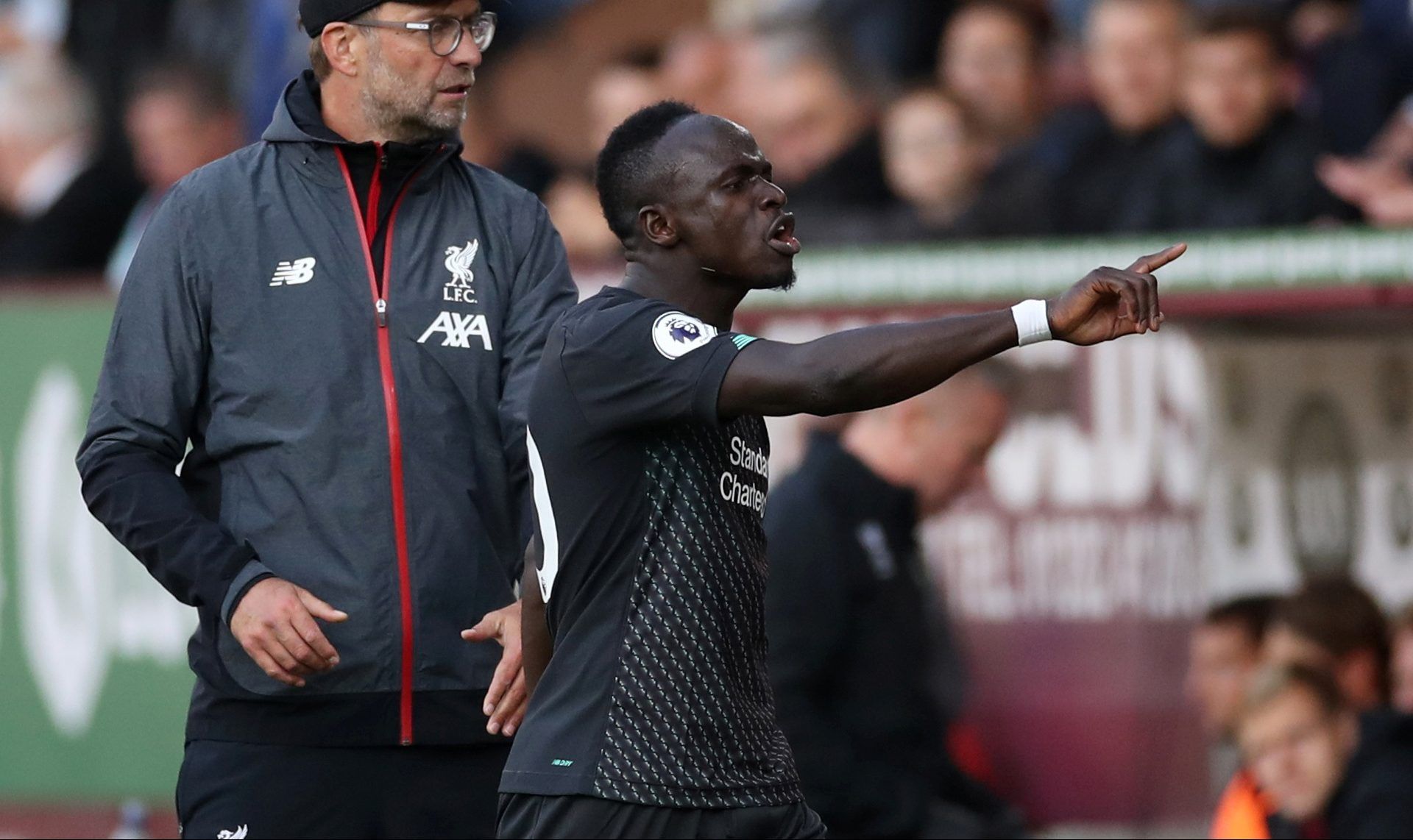 Soccer Football - Premier League - Burnley v Liverpool - Turf Moor, Burnley, Britain - August 31, 2019  Liverpool's Sadio Mane reacts after being substituted off as manager Juergen Klopp looks on  Action Images via Reuters/Carl Recine  EDITORIAL USE ONLY. No use with unauthorized audio, video, data, fixture lists, club/league logos or 