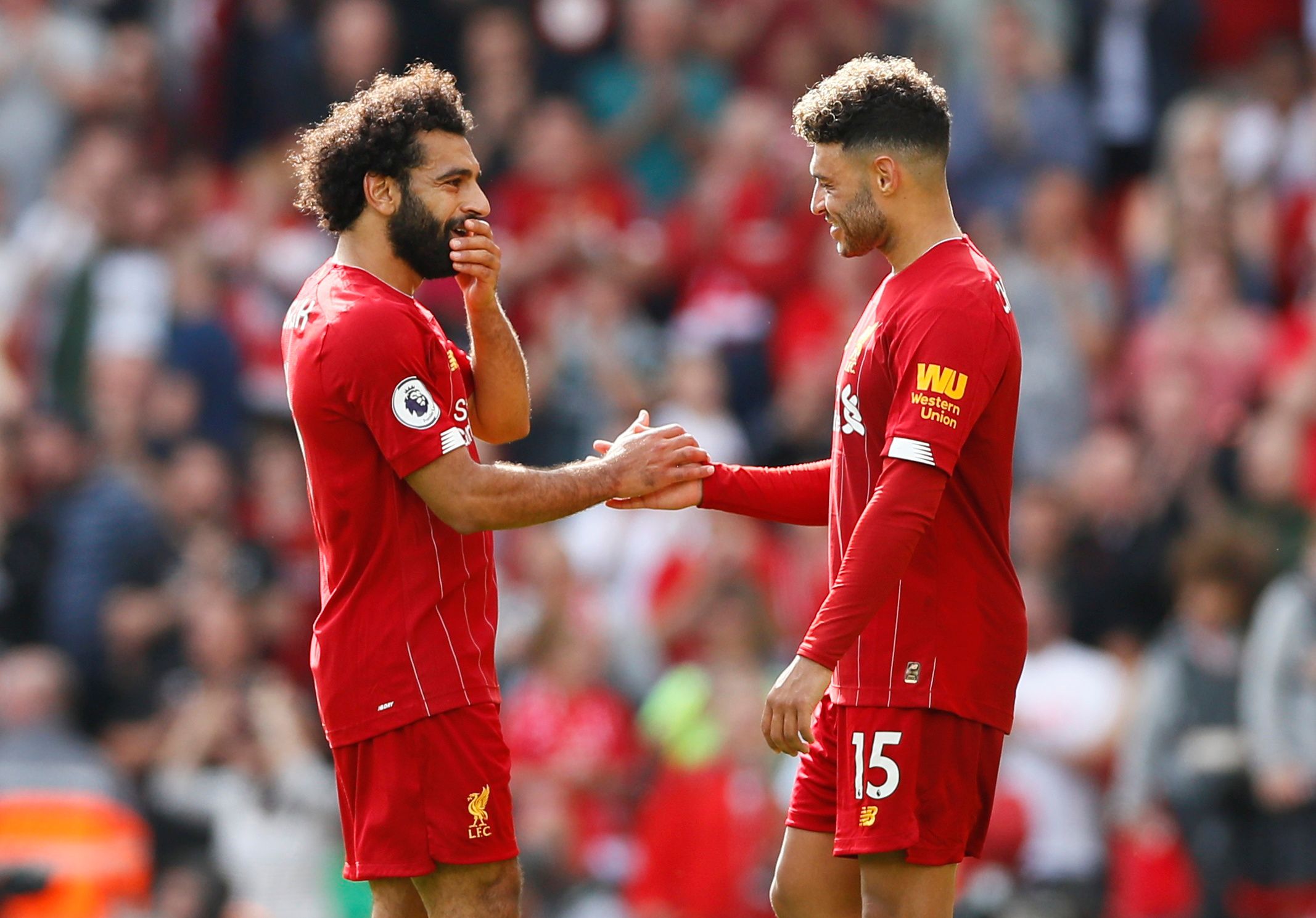 Soccer Football - Premier League - Liverpool v Newcastle United - Anfield, Liverpool, Britain - September 14, 2019  Liverpool's Mohamed Salah and Alex Oxlade-Chamberlain after the match  Action Images via Reuters/Jason Cairnduff  EDITORIAL USE ONLY. No use with unauthorized audio, video, data, fixture lists, club/league logos or 