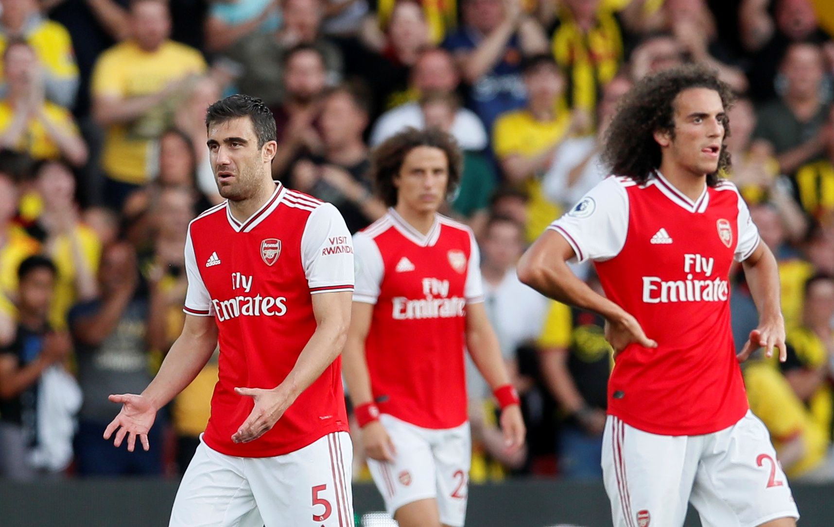 Soccer Football - Premier League - Watford v Arsenal - Vicarage Road, Watford, Britain - September 15, 2019  Arsenal's Sokratis Papastathopoulos, Matteo Guendouzi and David Luiz look dejected after conceding their first goal REUTERS/David Klein  EDITORIAL USE ONLY. No use with unauthorized audio, video, data, fixture lists, club/league logos or 