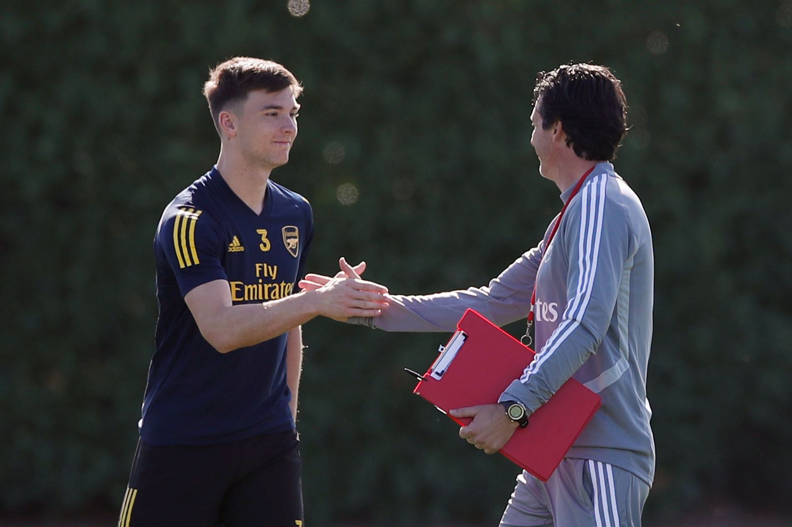 Soccer Football - Europa League - Arsenal Training - Arsenal Training Centre, St Albans, Britain - September 18, 2019   Arsenal manager Unai Emery and Kieran Tierney during training   Action Images via Reuters/Paul Childs