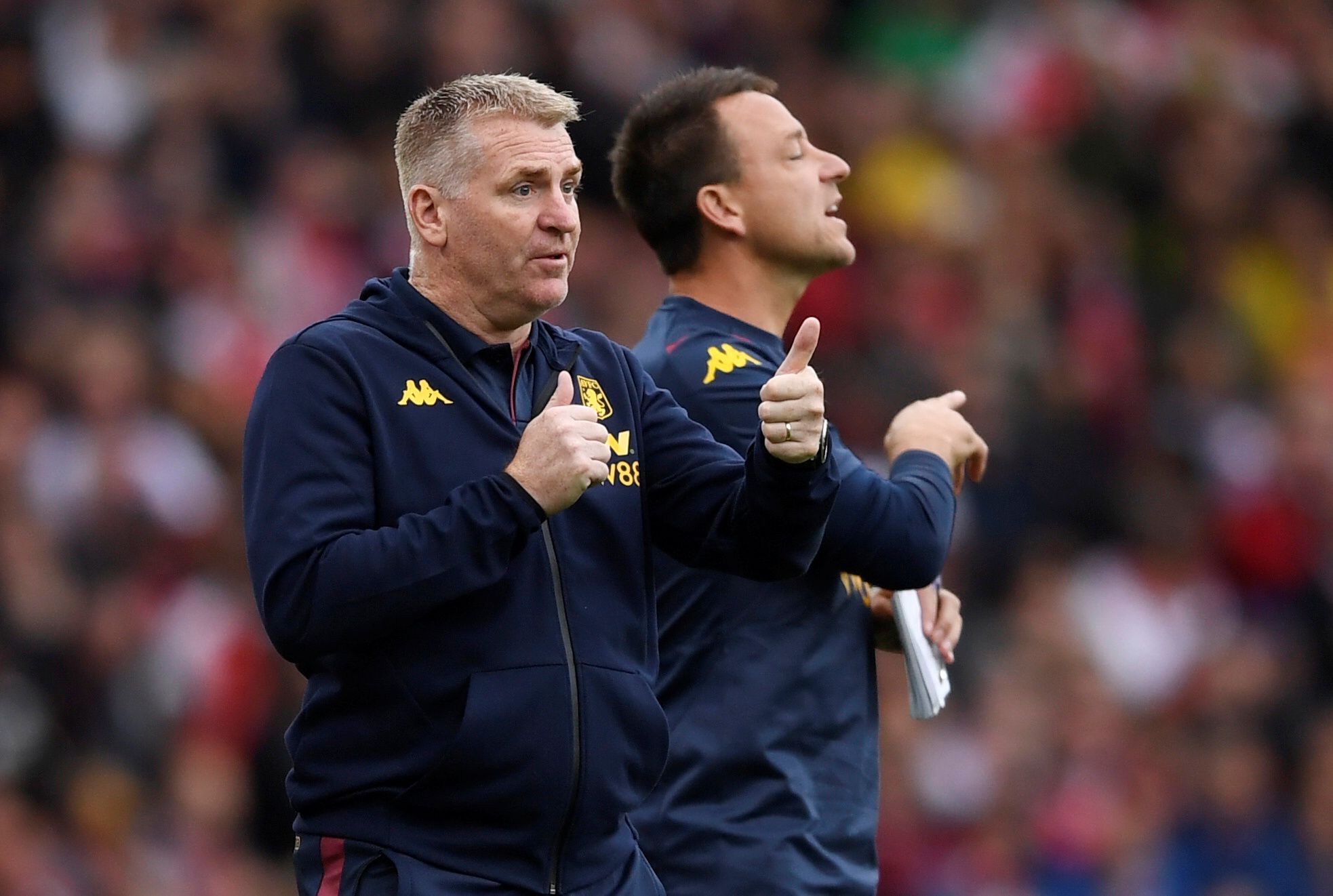 Soccer Football - Premier League - Arsenal v Aston Villa - Emirates Stadium, London, Britain - September 22, 2019  Aston Villa manager Dean Smith and assistant manager John Terry gesture during the match       Action Images via Reuters/Tony O'Brien  EDITORIAL USE ONLY. No use with unauthorized audio, video, data, fixture lists, club/league logos or 