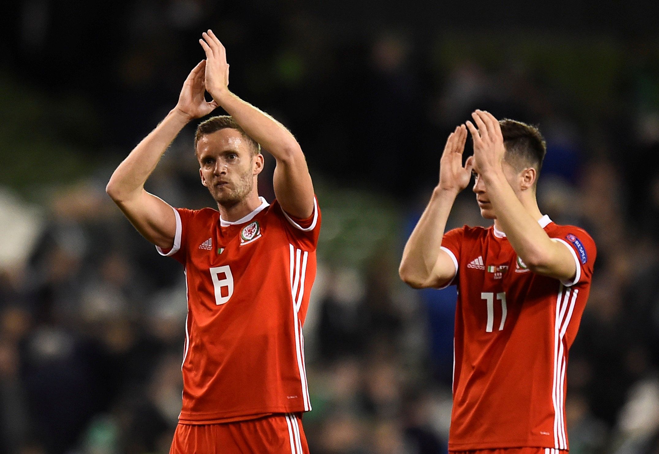 Soccer Football - UEFA Nations League - League B - Group 4 - Republic of Ireland v Wales - Aviva Stadium, Dublin, Republic of Ireland - October 16, 2018  Wales' Andy King and Tom Lawrence applaud their fans after the match   REUTERS/Clodagh Kilcoyne