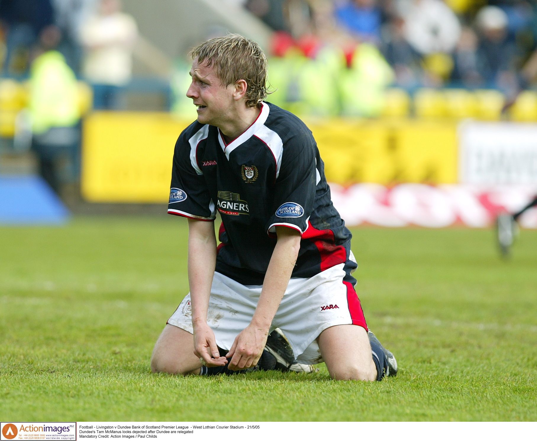 Football - Livingston v Dundee Bank of Scotland Premier League  - West Lothian Courier Stadium - 21/5/05 
Dundee's Tam McManus looks dejected after Dundee are relegated 
Mandatory Credit: Action Images / Paul Childs