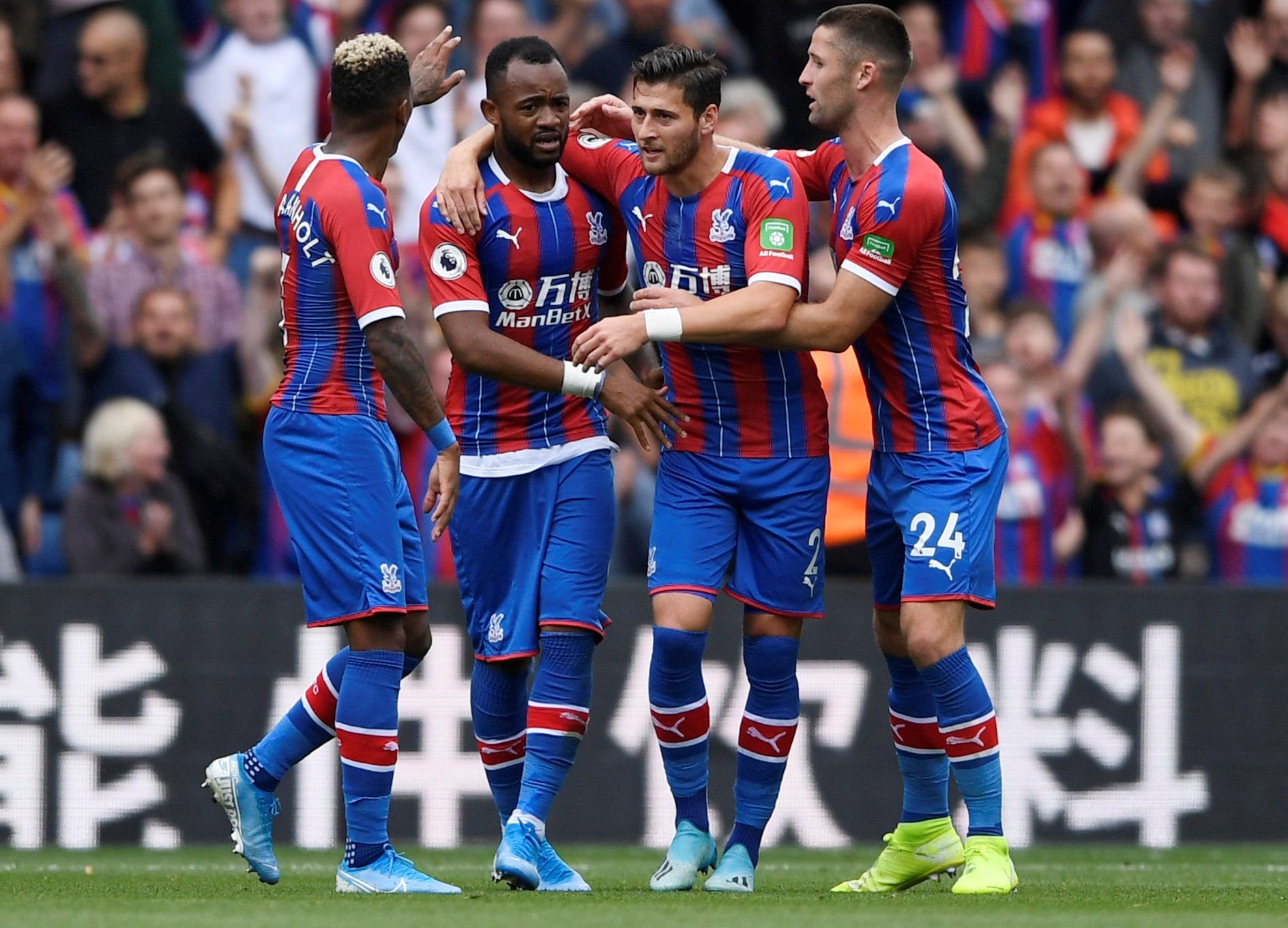 Soccer Football - Premier League - Crystal Palace v Aston Villa - Selhurst Park, London, Britain - August 31, 2019  Crystal Palace's Jordan Ayew celebrates scoring their first goal with Joel Ward, Patrick van Aanholt and Gary Cahill        Action Images via Reuters/Tony O'Brien  EDITORIAL USE ONLY. No use with unauthorized audio, video, data, fixture lists, club/league logos or 