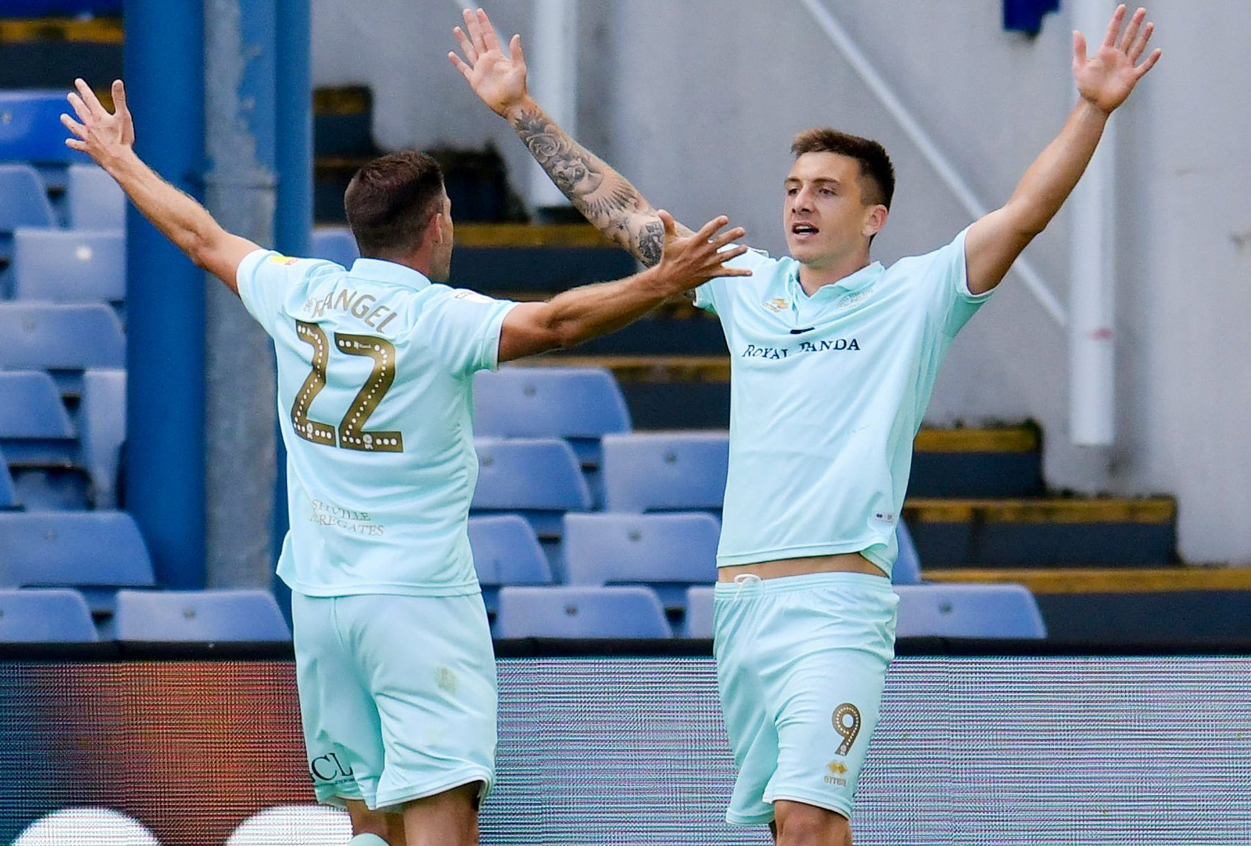 Soccer Football - Championship - Sheffield Wednesday v Queens Park Rangers - Hillsborough, Sheffield, Britain - August 31, 2019   Queens Park Rangers' Jordan Hugill celebrates scoring their first goal with Angel Rangel   Action Images/Paul Burrows    EDITORIAL USE ONLY. No use with unauthorized audio, video, data, fixture lists, club/league logos or 