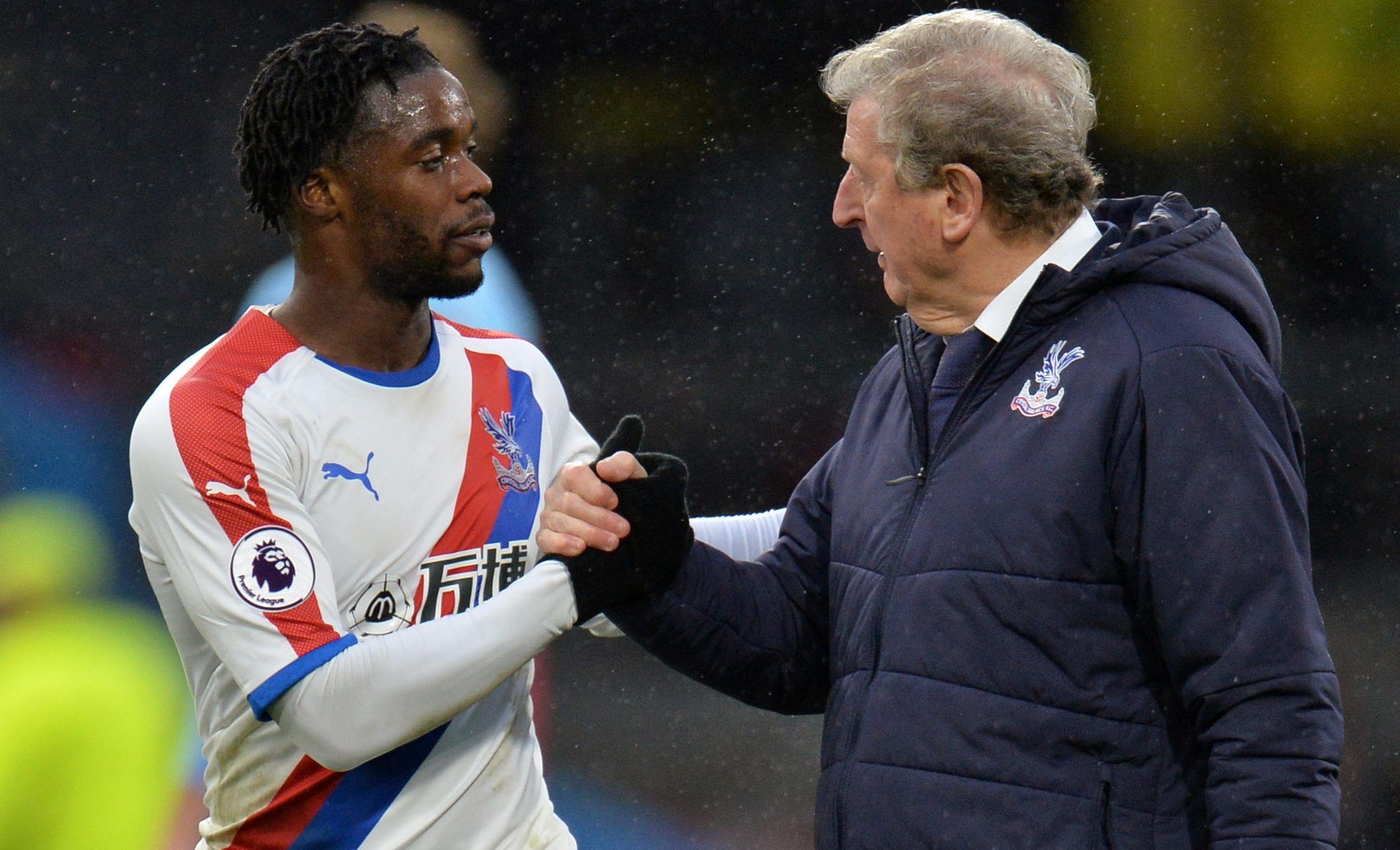 Soccer Football - Premier League - Burnley v Crystal Palace - Turf Moor, Burnley, Britain - March 2, 2019  Crystal Palace manager Roy Hodgson shakes hands with Jeffrey Schlupp at the end of the match   REUTERS/Peter Powell  EDITORIAL USE ONLY. No use with unauthorized audio, video, data, fixture lists, club/league logos or 