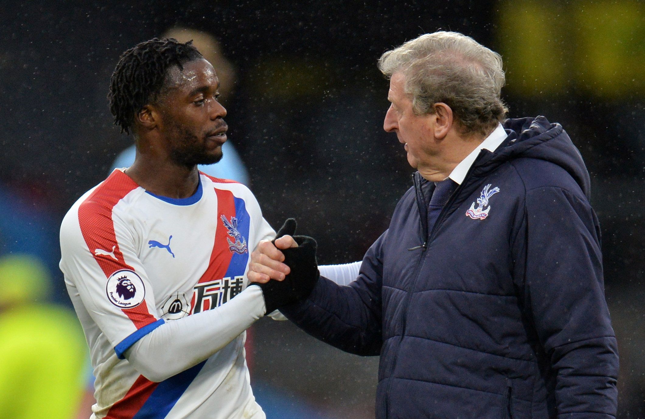 Soccer Football - Premier League - Burnley v Crystal Palace - Turf Moor, Burnley, Britain - March 2, 2019  Crystal Palace manager Roy Hodgson shakes hands with Jeffrey Schlupp at the end of the match   REUTERS/Peter Powell  EDITORIAL USE ONLY. No use with unauthorized audio, video, data, fixture lists, club/league logos or "live" services. Online in-match use limited to 75 images, no video emulation. No use in betting, games or single club/league/player publications.  Please contact your account