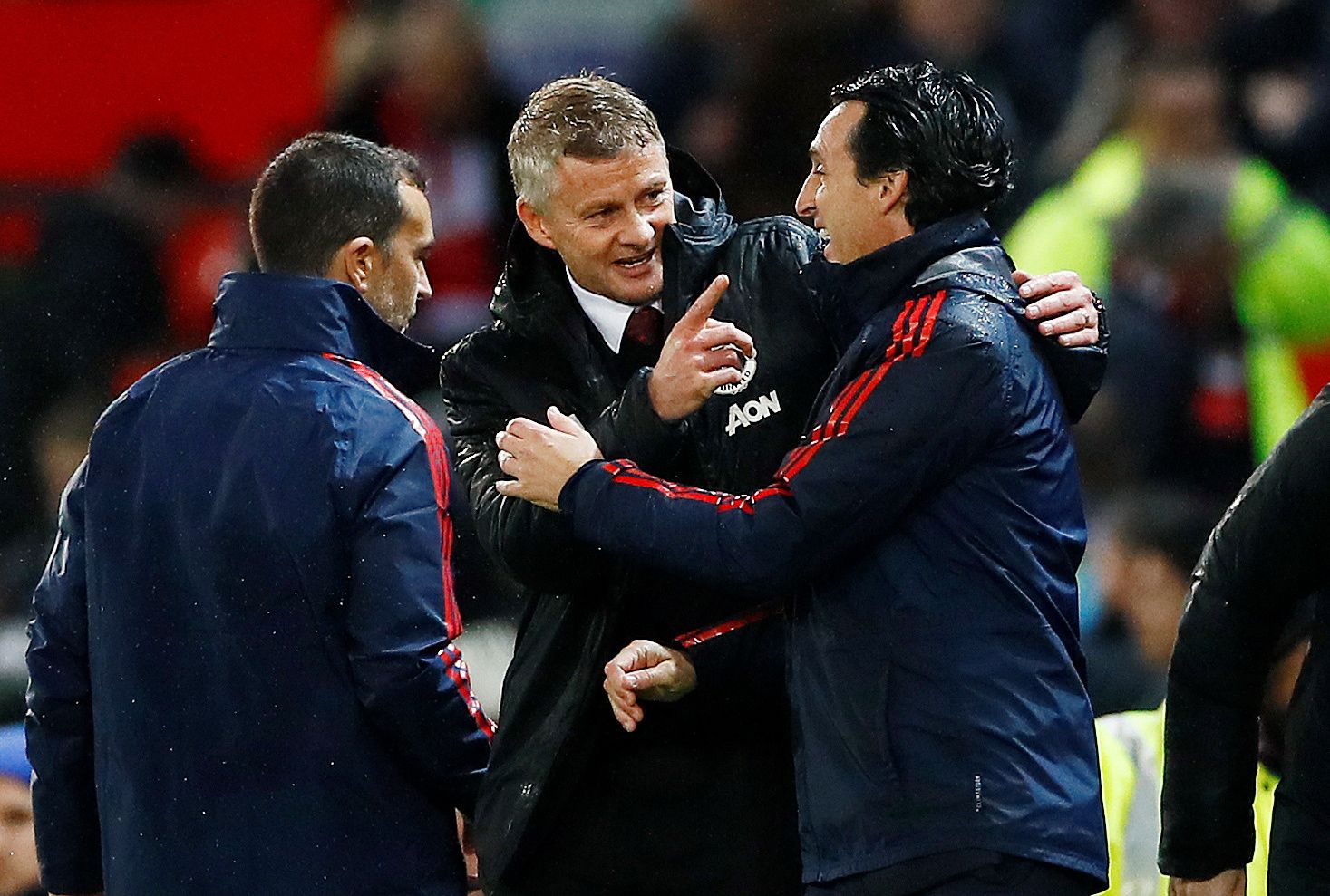 Soccer Football - Premier League - Manchester United v Arsenal - Old Trafford, Manchester, Britain - September 30, 2019   Manchester United manager Ole Gunnar Solskjaer embraces Arsenal manager Unai Emery at the end of the match    Action Images via Reuters/Jason Cairnduff    EDITORIAL USE ONLY. No use with unauthorized audio, video, data, fixture lists, club/league logos or 