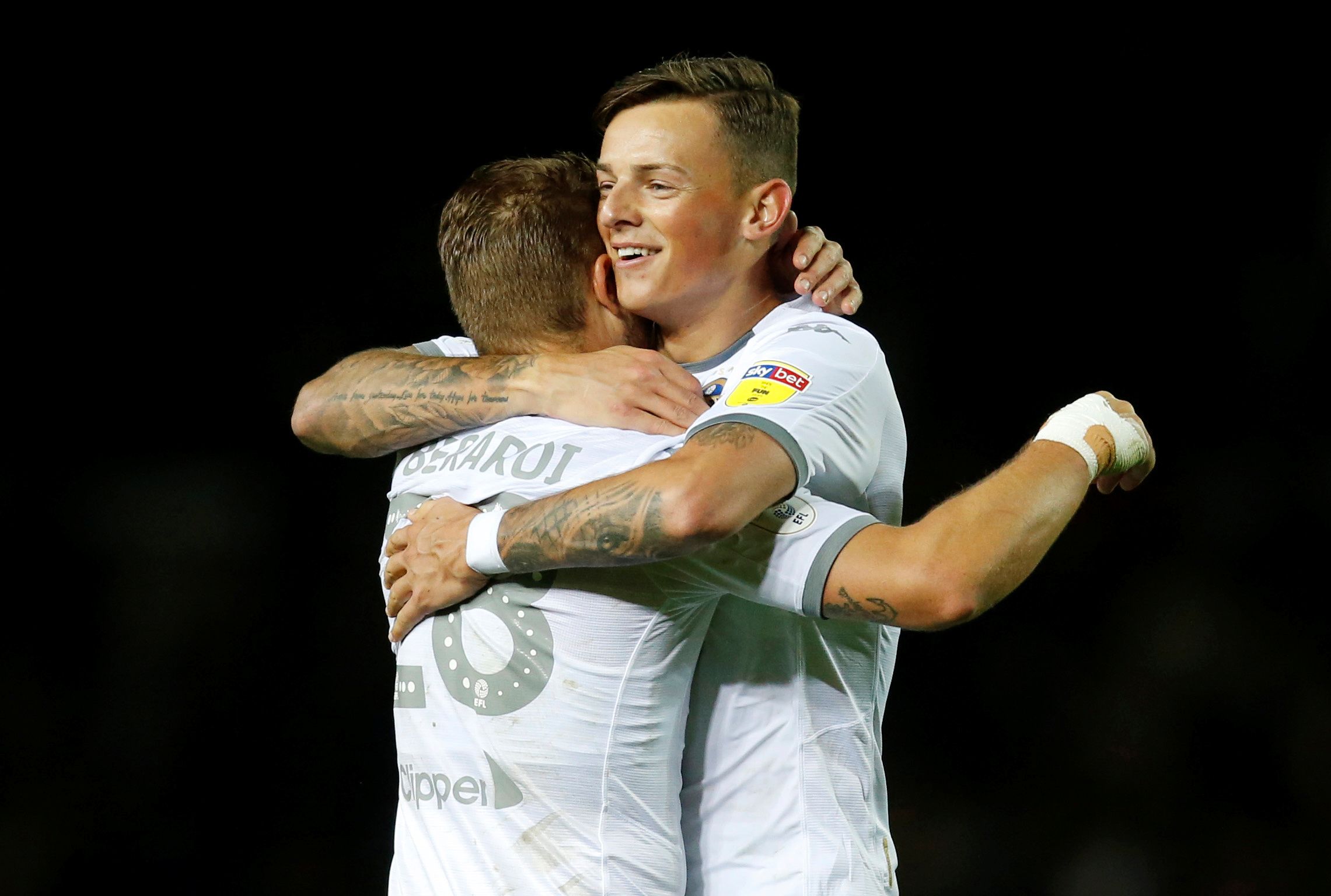 Soccer Football - Championship - Leeds United v West Bromwich Albion - Elland Road, Leeds, Britain - October 1, 2019  Leeds United's Ben White and Gaetano Berardi celebrate after the match  Action Images/Ed Sykes  EDITORIAL USE ONLY. No use with unauthorized audio, video, data, fixture lists, club/league logos or 