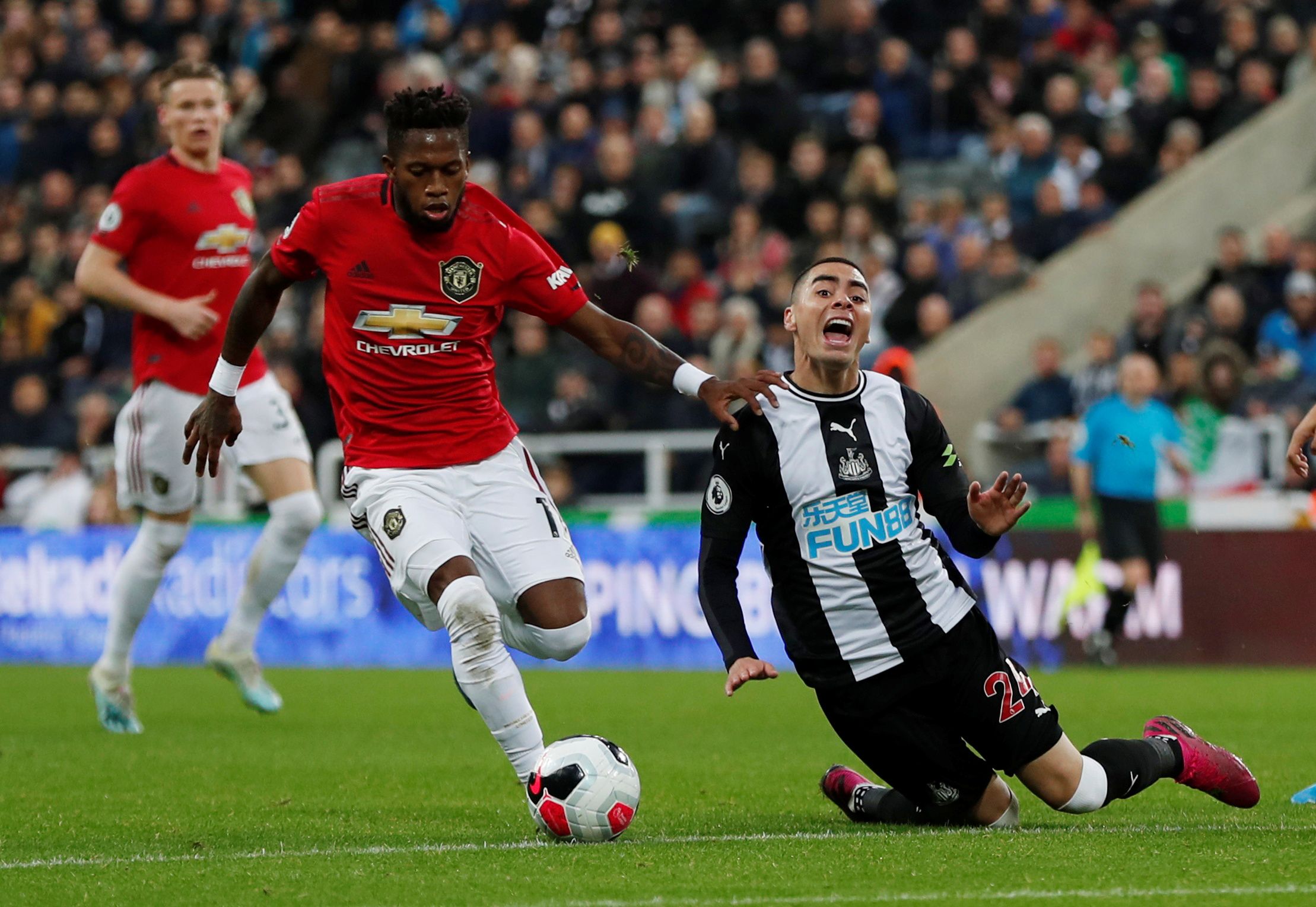 Soccer Football - Premier League - Newcastle United v Manchester United - St James' Park, Newcastle, Britain - October 6, 2019  Newcastle United's Miguel Almiron reacts as Manchester United's Fred plays on  Action Images via Reuters/Lee Smith  EDITORIAL USE ONLY. No use with unauthorized audio, video, data, fixture lists, club/league logos or 