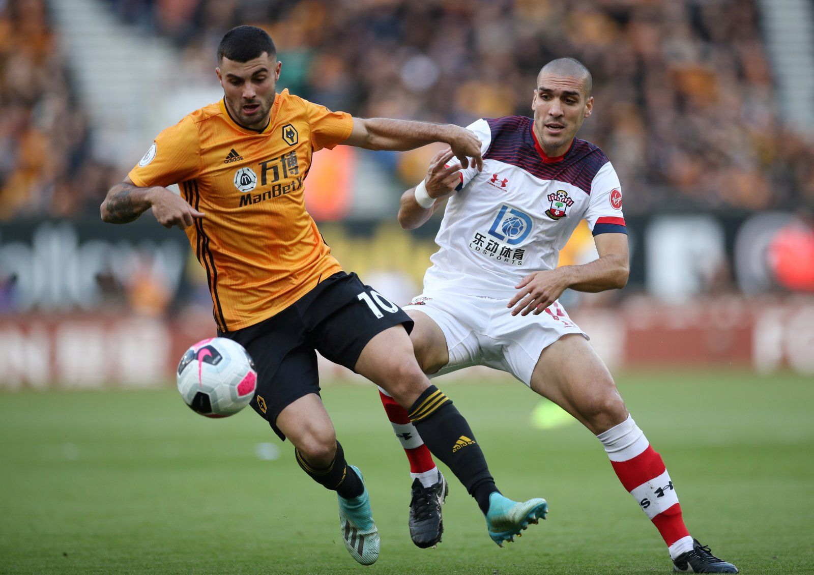 Wolverhampton Wanderers' Patrick Cutrone in action with Southampton's Oriol Romeu