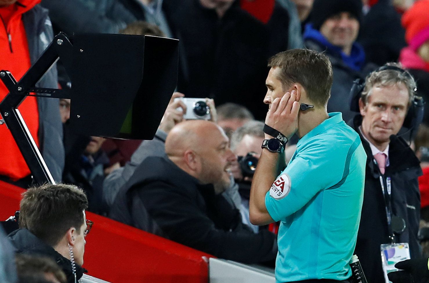 Soccer Football - FA Cup Fourth Round - Liverpool vs West Bromwich Albion - Anfield, Liverpool, Britain - January 27, 2018   Referee Craig Pawson watches a monitor before awarding a penalty to Liverpool upon VAR (Video Assistant Referee) review   Action Images via Reuters/Jason Cairnduff