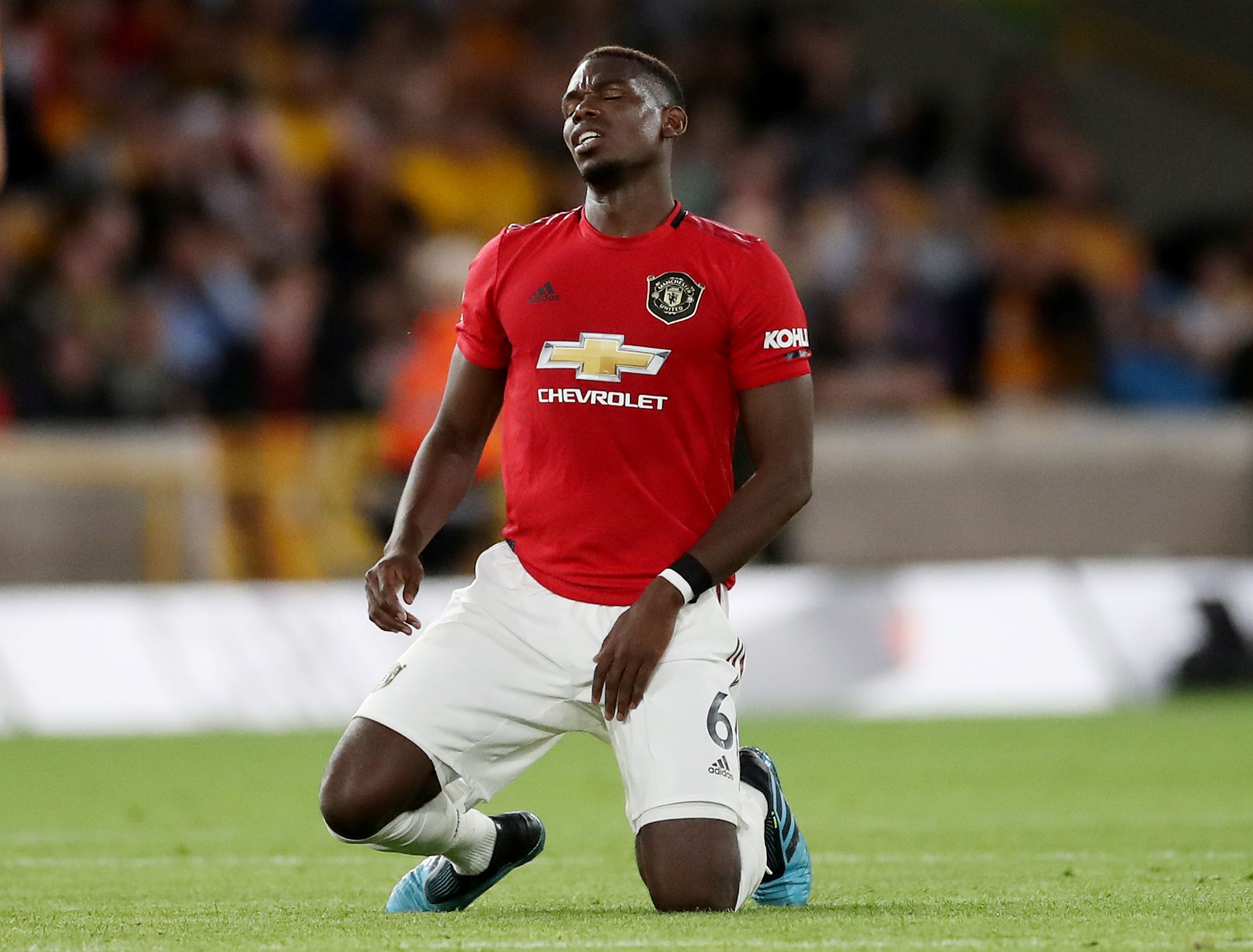 Soccer Football - Premier League - Wolverhampton Wanderers v Manchester United - Molineux Stadium, Wolverhampton, Britain - August 19, 2019   Manchester United's Paul Pogba reacts   Action Images via Reuters/Carl Recine    EDITORIAL USE ONLY. No use with unauthorized audio, video, data, fixture lists, club/league logos or 
