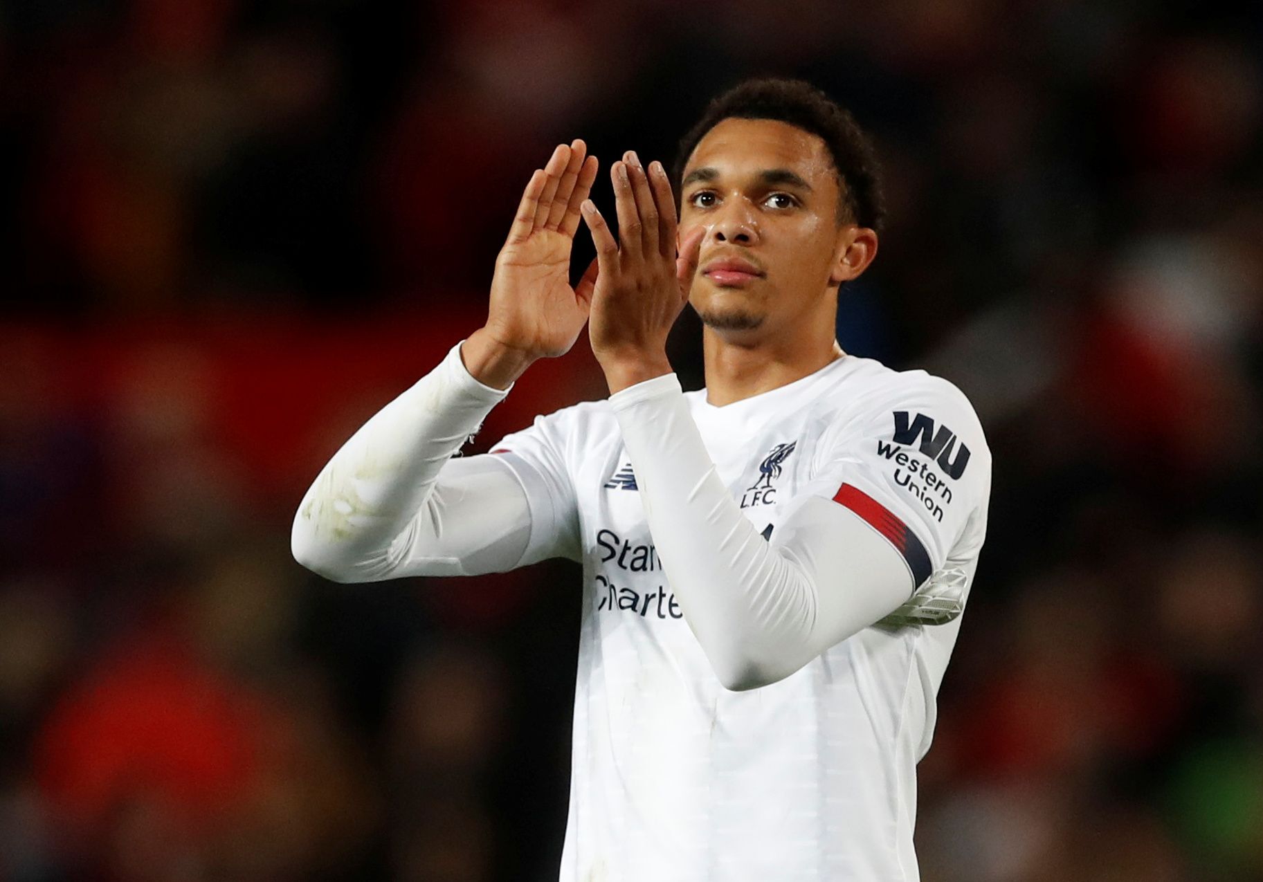Soccer Football - Premier League - Manchester United v Liverpool - Old Trafford, Manchester, Britain - October 20, 2019  Liverpool's Trent Alexander-Arnold applauds fans after the match        REUTERS/Russell Cheyne  EDITORIAL USE ONLY. No use with unauthorized audio, video, data, fixture lists, club/league logos or 