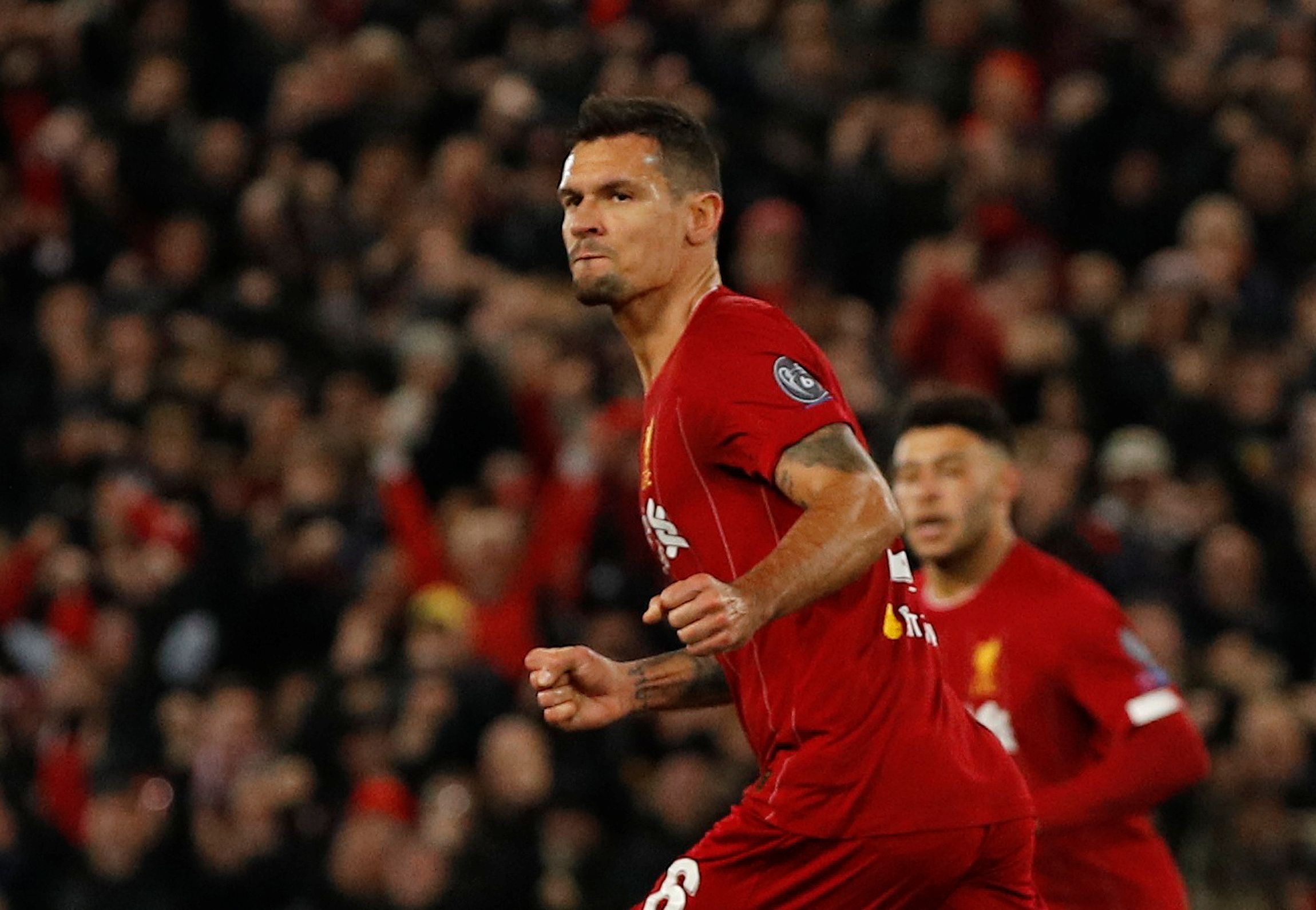 Soccer Football - Champions League - Group E - Liverpool v Napoli - Anfield, Liverpool, Britain - November 27, 2019  Liverpool's Dejan Lovren celebrates scoring their first goal   REUTERS/Phil Noble