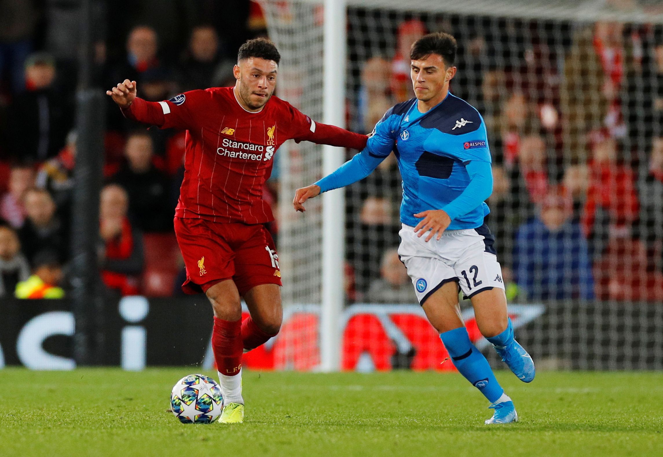Soccer Football - Champions League - Group E - Liverpool v Napoli - Anfield, Liverpool, Britain - November 27, 2019  Liverpool's Alex Oxlade-Chamberlain in action with Napoli's Elif Elmas    REUTERS/Phil Noble