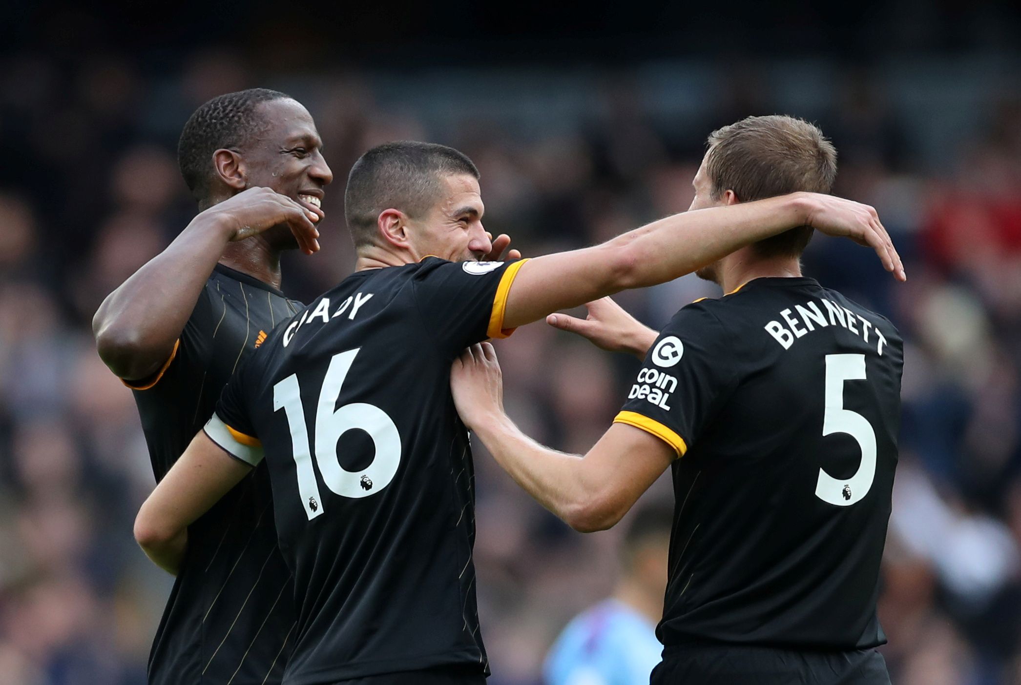 Soccer Football - Premier League - Manchester City v Wolverhampton Wanderers - Etihad Stadium, Manchester, Britain - October 6, 2019  Wolverhampton Wanderers' Conor Coady celebrates with Ryan Bennett and Willy Boly   Action Images via Reuters/Carl Recine  EDITORIAL USE ONLY. No use with unauthorized audio, video, data, fixture lists, club/league logos or 