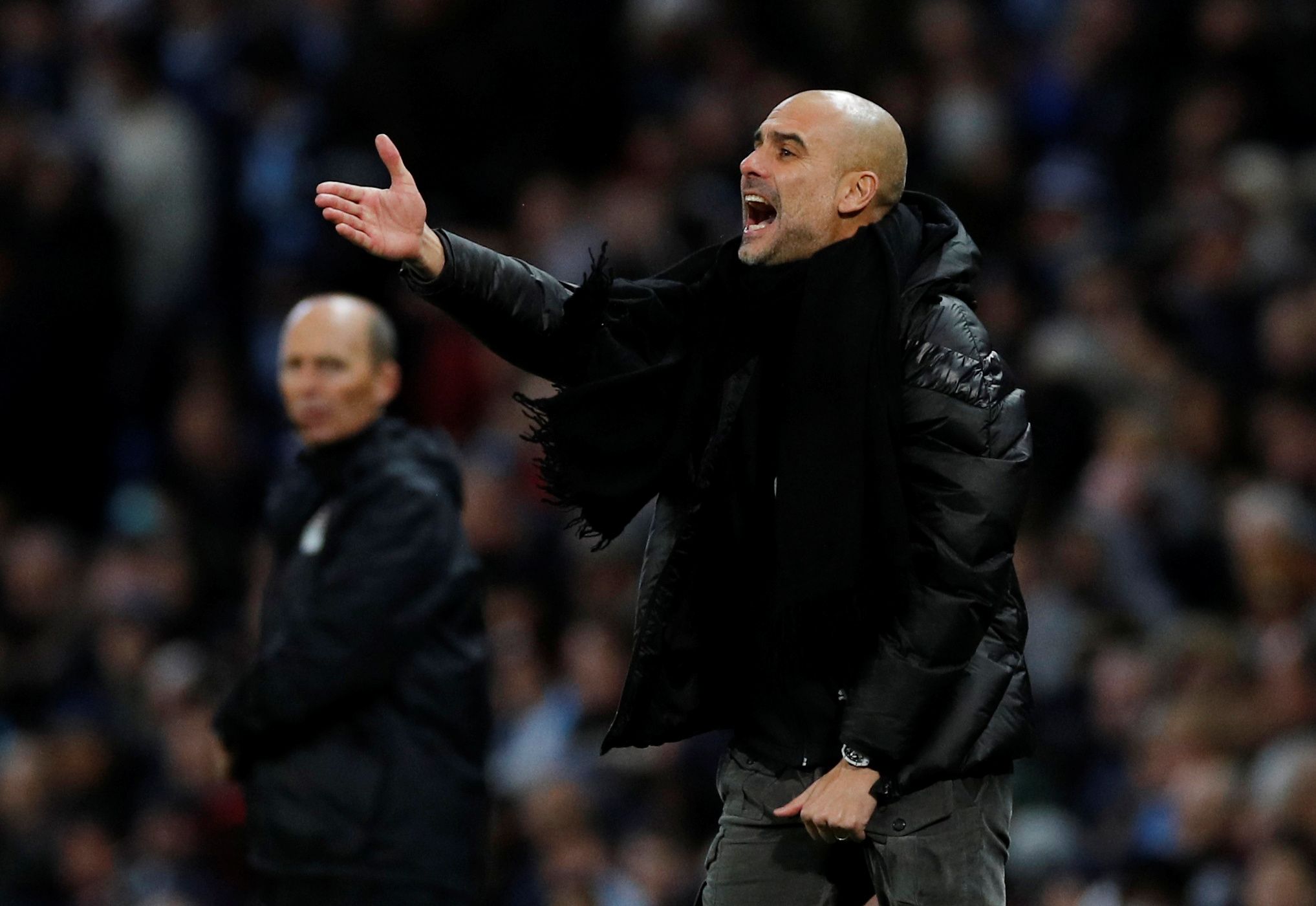 Soccer Football - Premier League - Manchester City v Manchester United - Etihad Stadium, Manchester, Britain - December 7, 2019  Manchester City manager Pep Guardiola reacts        REUTERS/Phil Noble  EDITORIAL USE ONLY. No use with unauthorized audio, video, data, fixture lists, club/league logos or 