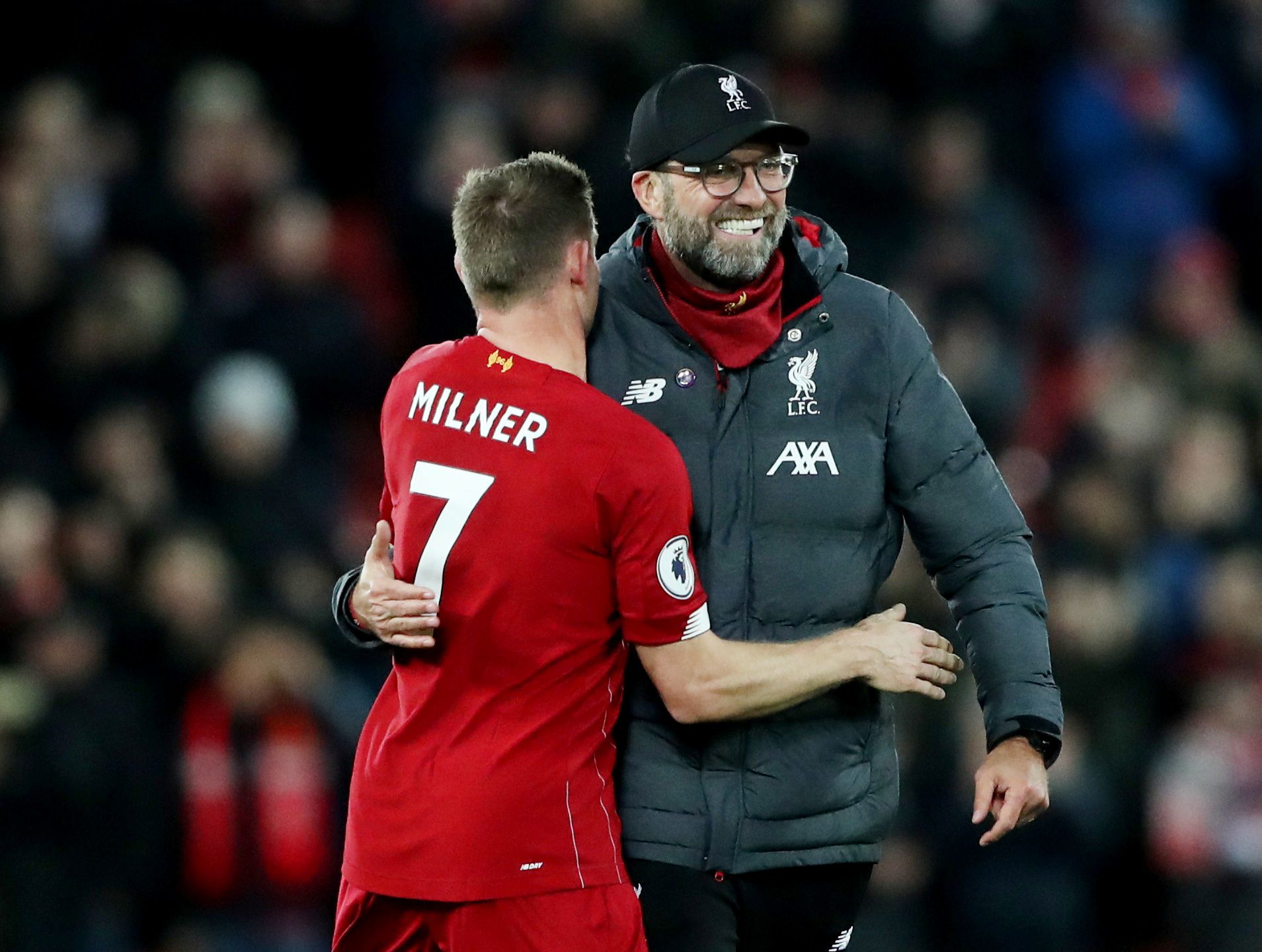 Soccer Football - Premier League - Liverpool v Everton - Anfield, Liverpool, Britain - December 4, 2019  Liverpool manager Juergen Klopp celebrates after the match with James Milner   REUTERS/Scott Heppell  EDITORIAL USE ONLY. No use with unauthorized audio, video, data, fixture lists, club/league logos or 