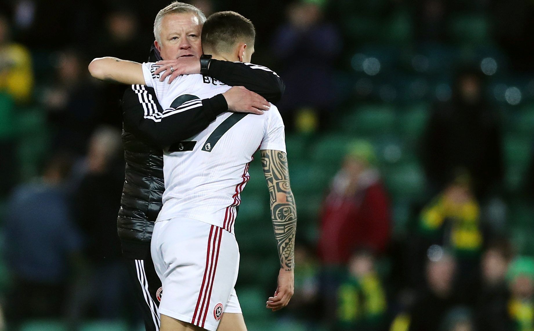 Soccer Football - Premier League - Norwich City v Sheffield United - Carrow Road, Norwich, Britain - December 8, 2019   Sheffield United manager Chris Wilder embraces Muhamed Besic after the match     Action Images via Reuters/Peter Cziborra  EDITORIAL USE ONLY. No use with unauthorized audio, video, data, fixture lists, club/league logos or 