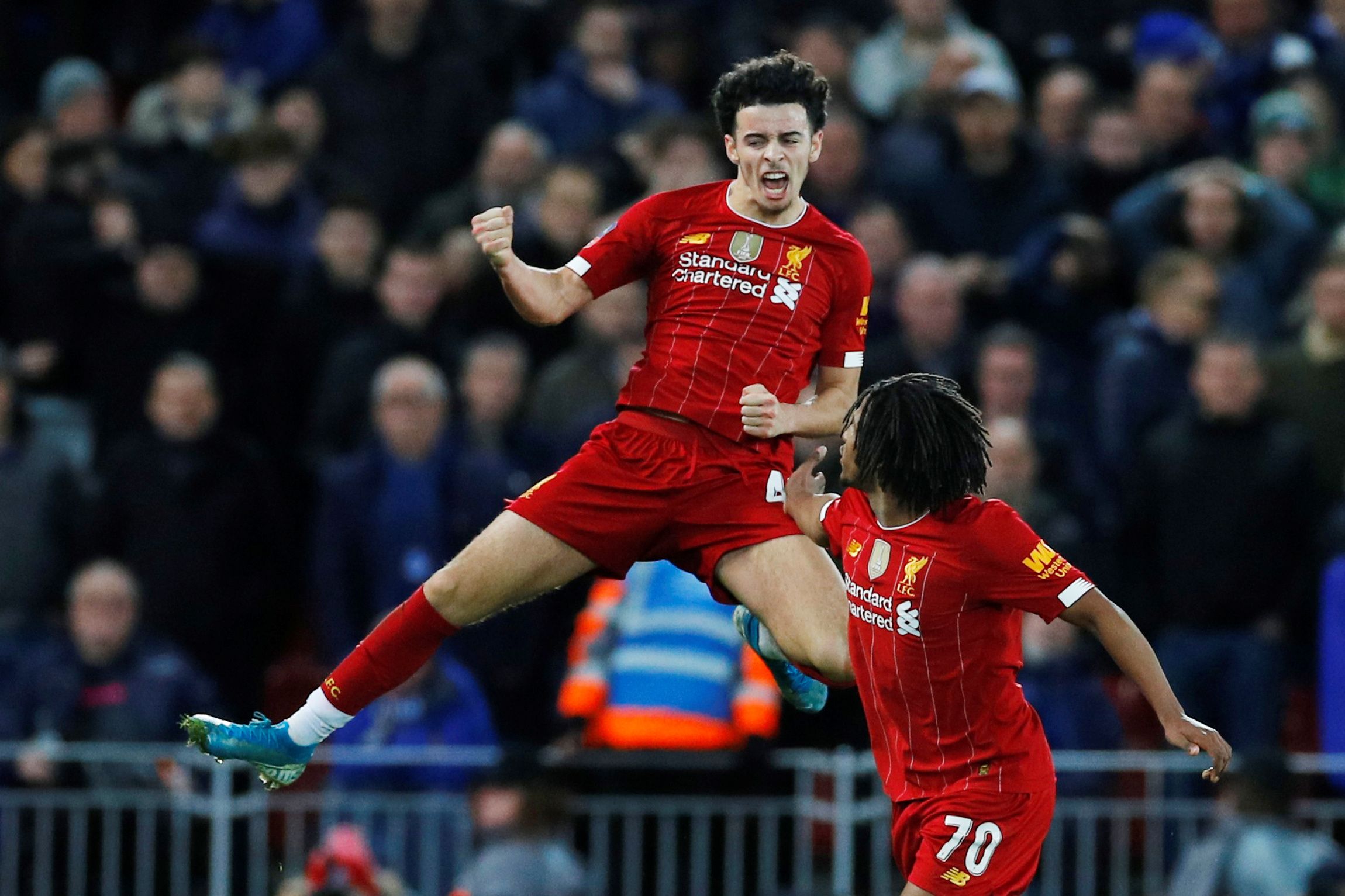 Soccer Football - FA Cup - Third Round - Liverpool v Everton - Anfield, Liverpool, Britain - January 5, 2020  Liverpool's Curtis Jones celebrates scoring their first goal with teammate Yasser Larouci   REUTERS/Phil Noble