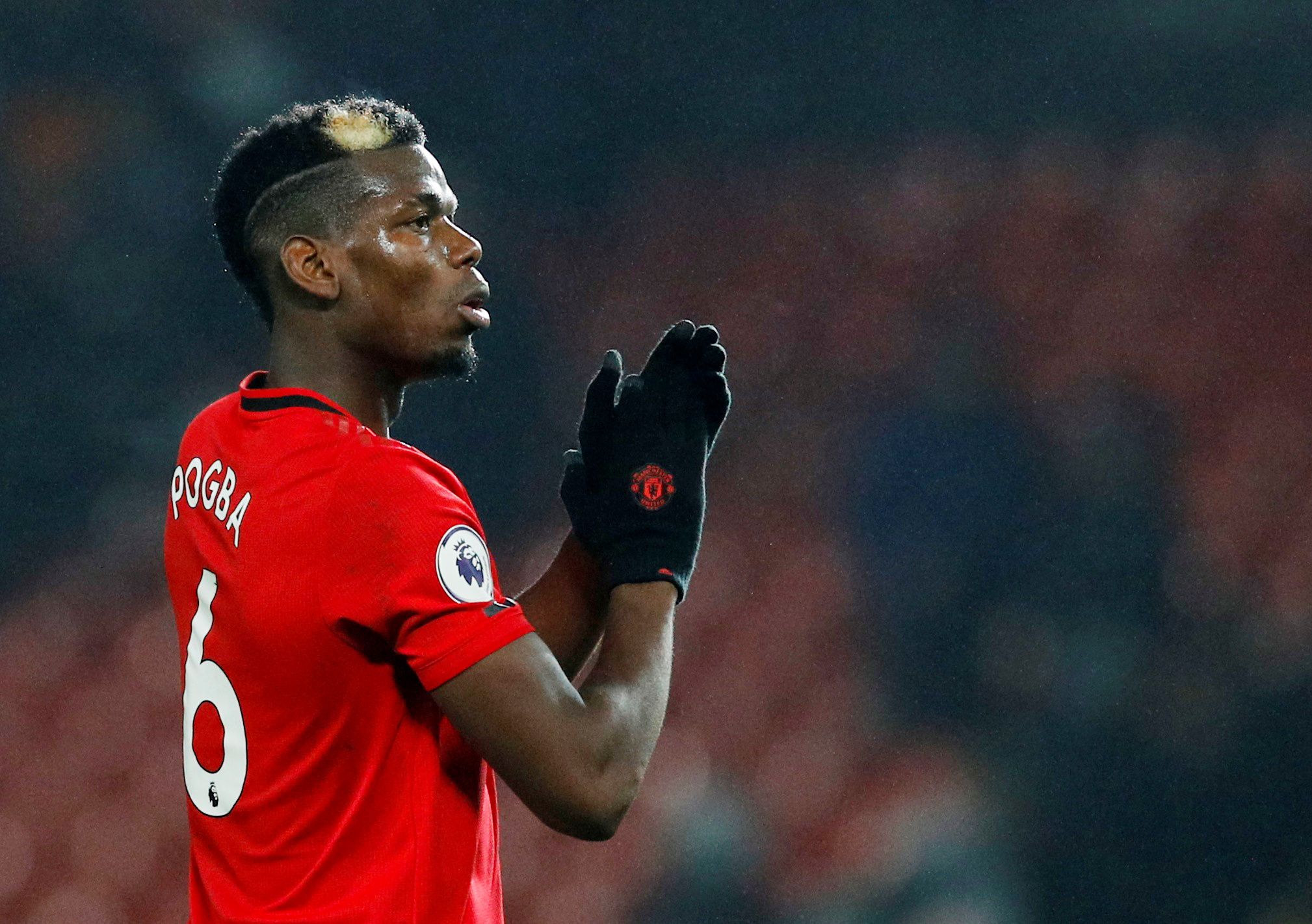 Soccer Football - Premier League - Manchester United v Newcastle United - Old Trafford, Manchester, Britain - December 26, 2019  Manchester United's Paul Pogba applauds fans after the match           REUTERS/Phil Noble  EDITORIAL USE ONLY. No use with unauthorized audio, video, data, fixture lists, club/league logos or 