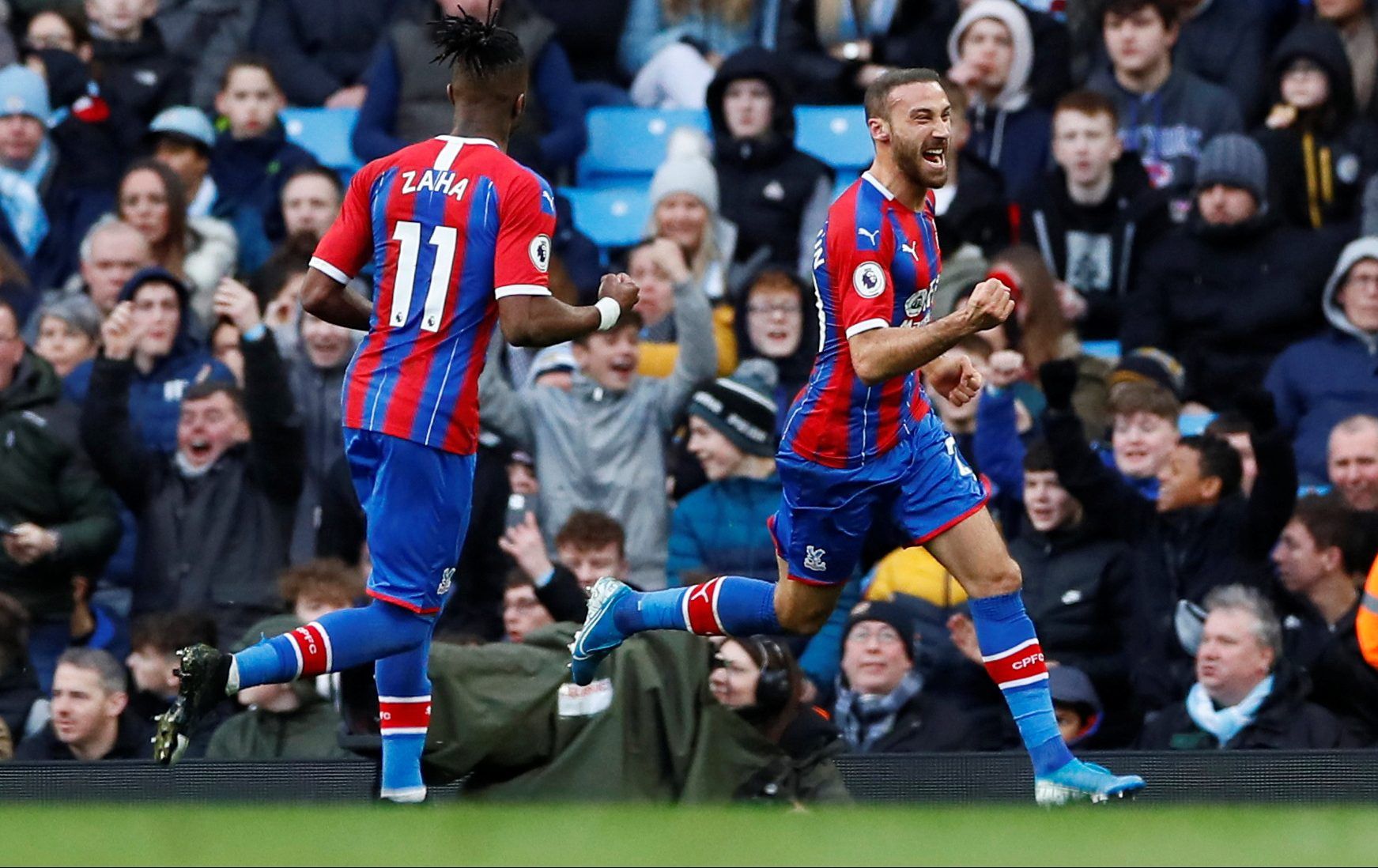 Soccer Football - Premier League - Manchester City v Crystal Palace - Etihad Stadium, Manchester, Britain - January 18, 2020  Crystal Palace's Cenk Tosun celebrates scoring their first goal          Action Images via Reuters/Jason Cairnduff  EDITORIAL USE ONLY. No use with unauthorized audio, video, data, fixture lists, club/league logos or 