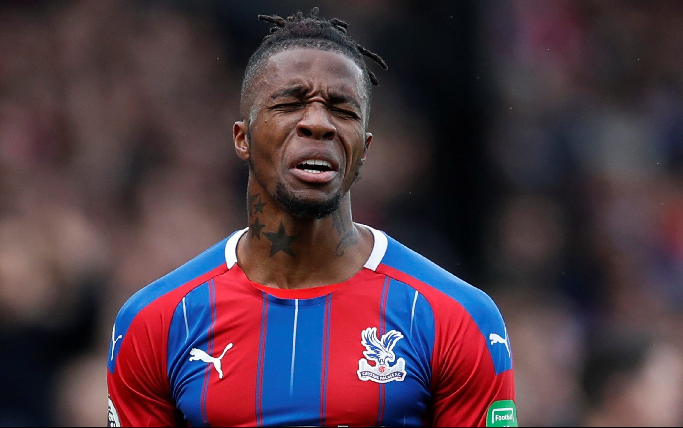Soccer Football - Premier League - Crystal Palace v Arsenal - Selhurst Park, London, Britain - January 11, 2020  Crystal Palace's Wilfried Zaha reacts REUTERS/David Klein  EDITORIAL USE ONLY. No use with unauthorized audio, video, data, fixture lists, club/league logos or 