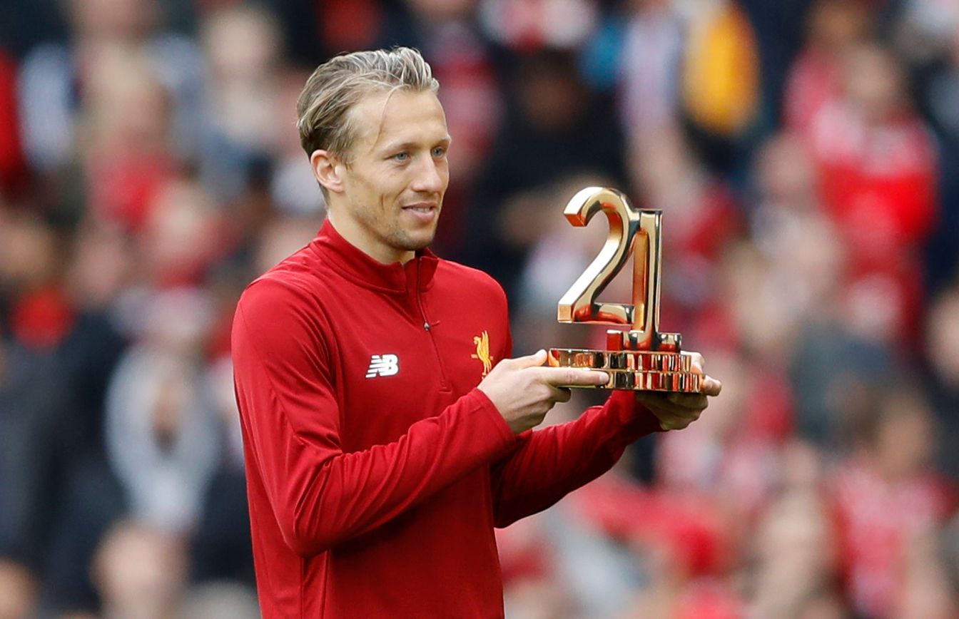 Britain Football Soccer - Liverpool v Middlesbrough - Premier League - Anfield - 21/5/17 Liverpool's Lucas Leiva holds a trophy after the match Action Images via Reuters / Carl Recine Livepic EDITORIAL USE ONLY. No use with unauthorized audio, video, data, fixture lists, club/league logos or 