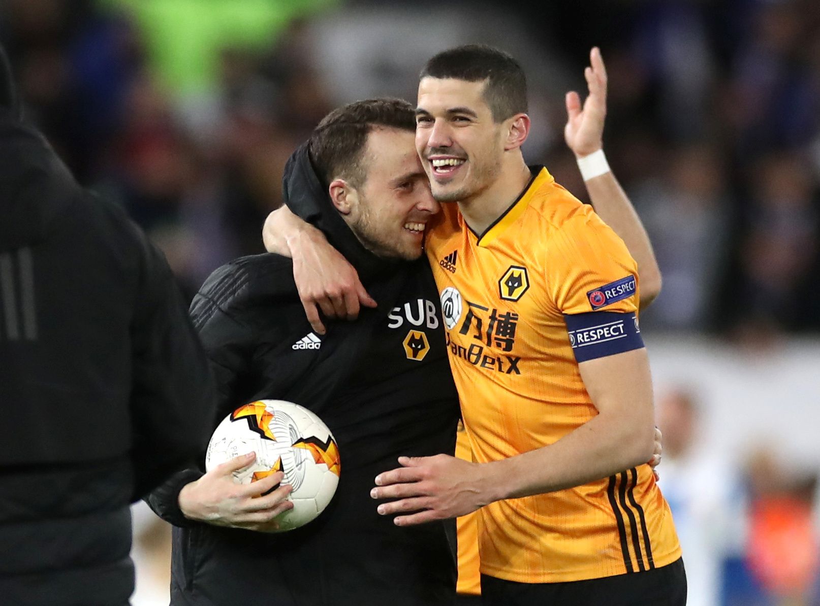 Soccer Football - Europa League - Round of 32 First Leg - Wolverhampton Wanderers v Espanyol - Molineux Stadium, Wolverhampton, Britain - February 20, 2020   Wolverhampton Wanderers' Diogo Jota celebrates holding the match ball with Conor Coady after the match    Action Images via Reuters/Carl Recine