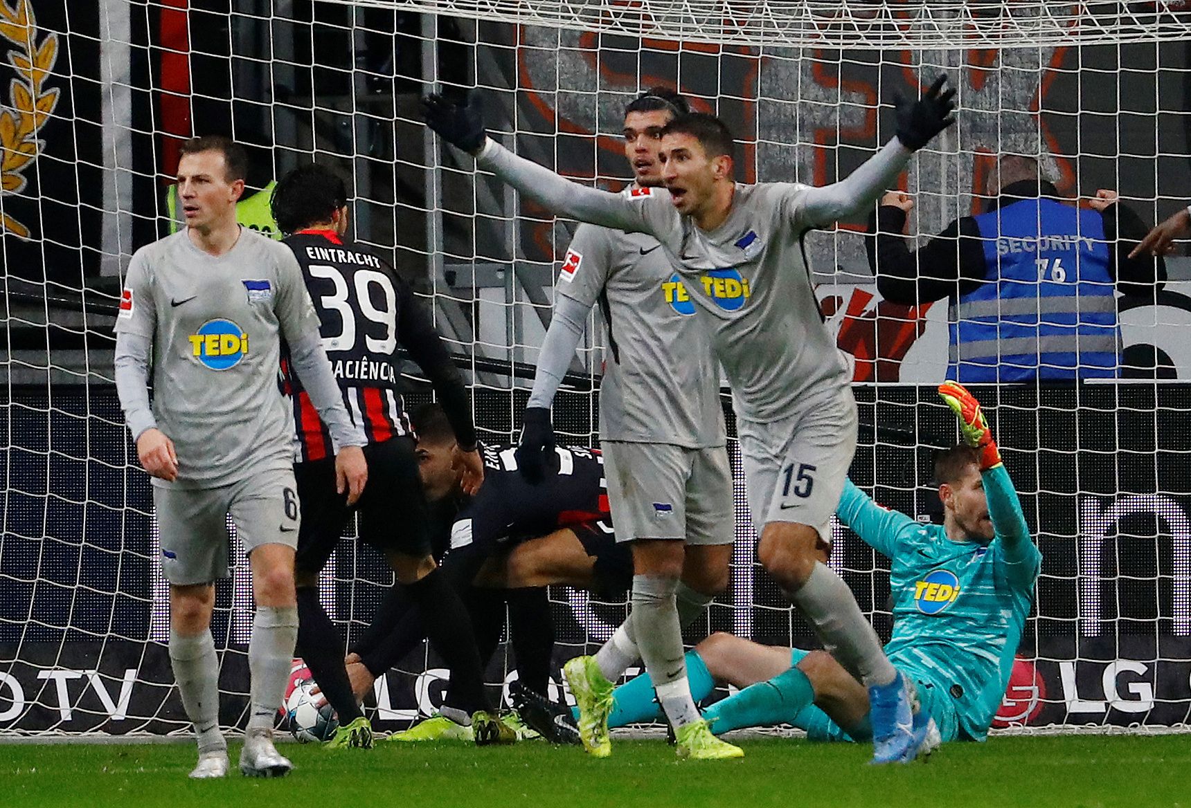 Soccer Football - Bundesliga - Eintracht Frankfurt v Hertha BSC - Commerzbank-Arena, Frankfurt, Germany - December 6, 2019   Hertha BSC's Marko Grujic and teammates react after Hertha BSC's Thomas Kraft is fouled   REUTERS/Kai Pfaffenbach    DFL regulations prohibit any use of photographs as image sequences and/or quasi-video