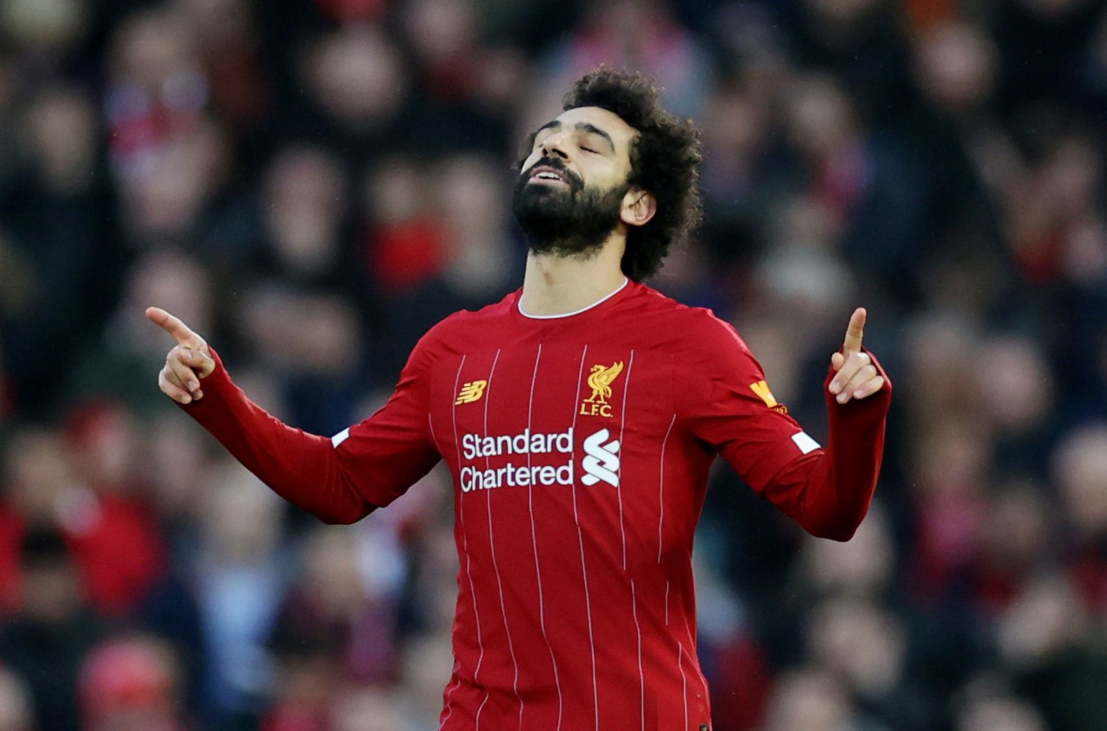 Soccer Football - Premier League - Liverpool v Southampton - Anfield, Liverpool, Britain - February 1, 2020  Liverpool's Mohamed Salah celebrates scoring their third goal   Action Images via Reuters/Carl Recine  EDITORIAL USE ONLY. No use with unauthorized audio, video, data, fixture lists, club/league logos or 