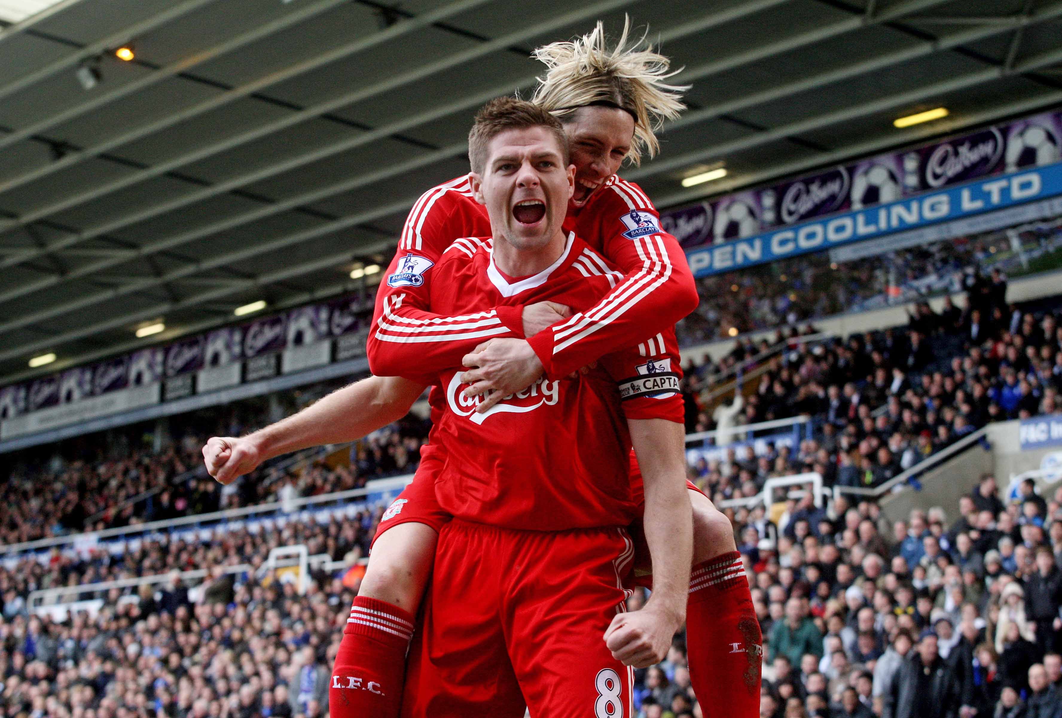 Football - Birmingham City v Liverpool Barclays Premier League - St Andrews - 09/10 - 4/4/10 
Steven Gerrard celebrates with Fernando Torres (R) after scoring Liverpool's first goal 
Mandatory Credit: Action Images / Scott Heavey 
Livepic 
NO ONLINE/INTERNET USE WITHOUT A LICENCE FROM THE FOOTBALL DATA CO LTD. FOR LICENCE ENQUIRIES PLEASE TELEPHONE +44 (0) 207 864 9000.