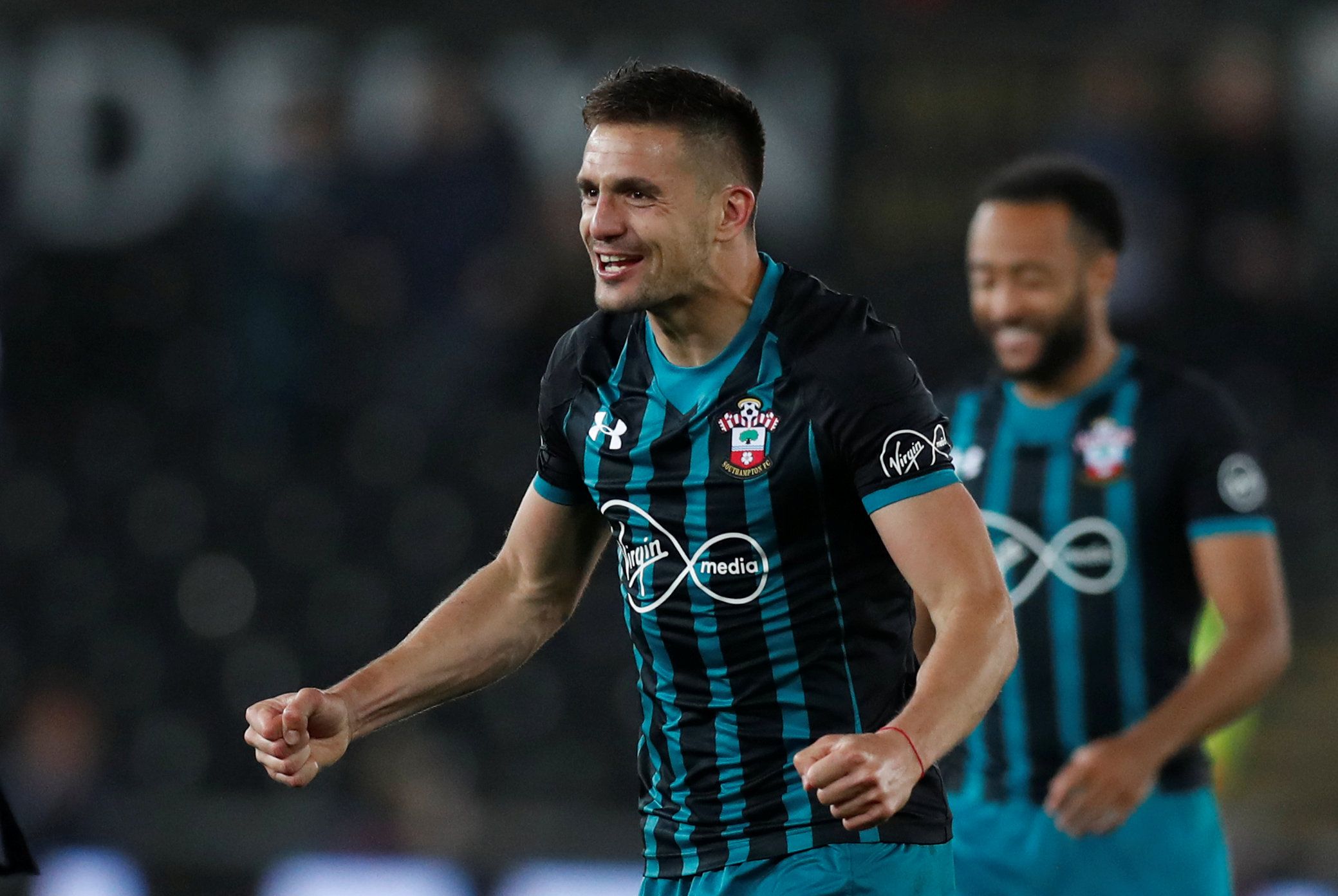 Soccer Football - Premier League - Swansea City v Southampton - Liberty Stadium, Swansea, Britain - May 8, 2018   Southampton's Dusan Tadic celebrates after the match    Action Images via Reuters/Peter Cziborra    EDITORIAL USE ONLY. No use with unauthorized audio, video, data, fixture lists, club/league logos or "live" services. Online in-match use limited to 75 images, no video emulation. No use in betting, games or single club/league/player publications.  Please contact your account represent