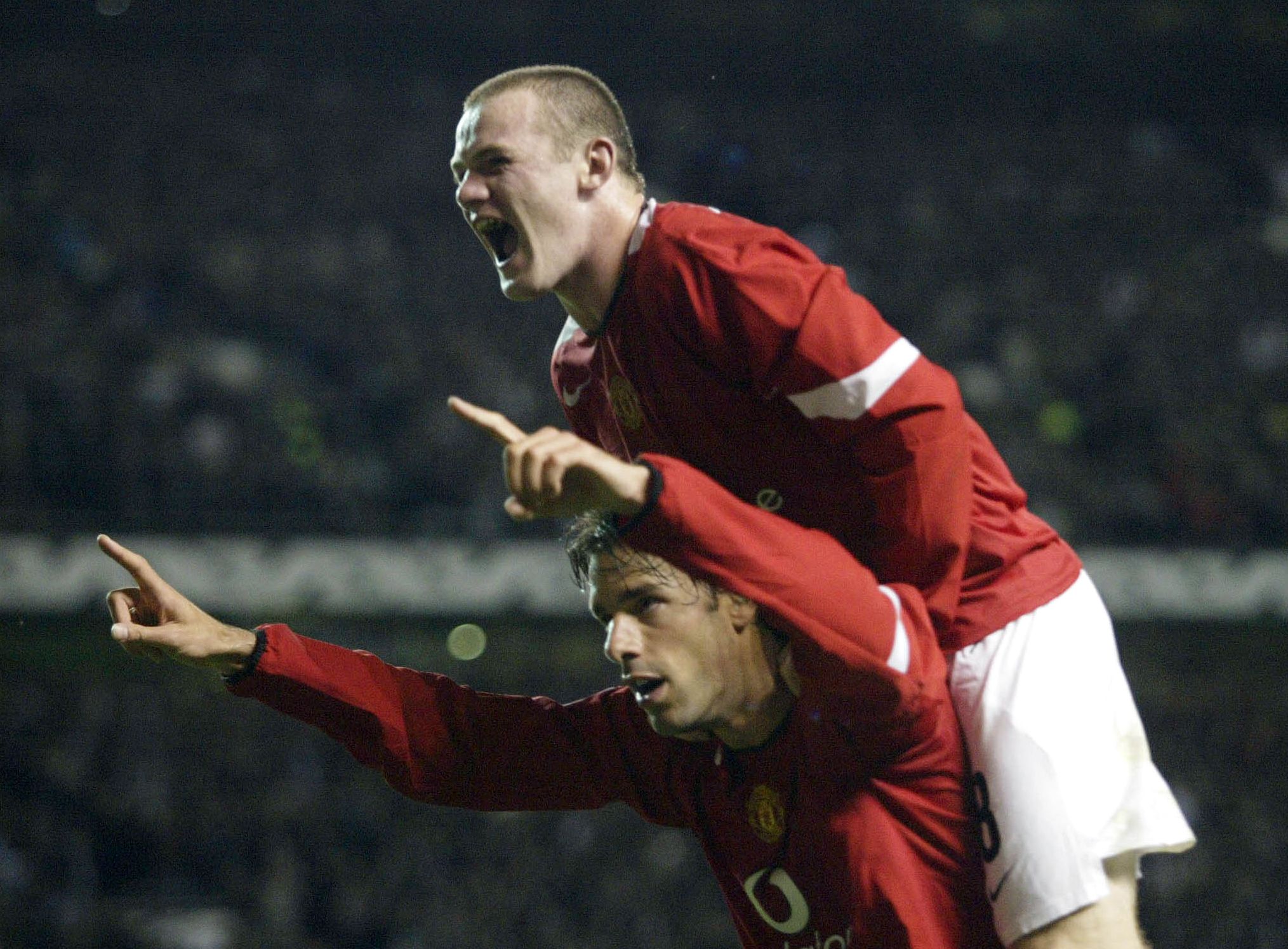 Champions League Group D match at Old Trafford.
Manchester United 6 v Fenerbahce 2.
Ruud Van Nistelrooy celebrates after scoring the fifth goal joined by teammate Wayne Rooney.
28th September 2004.
