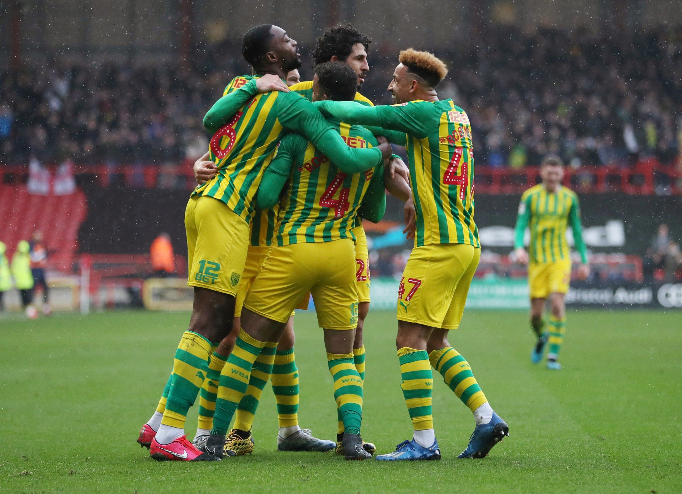 west brom players celebrate goal