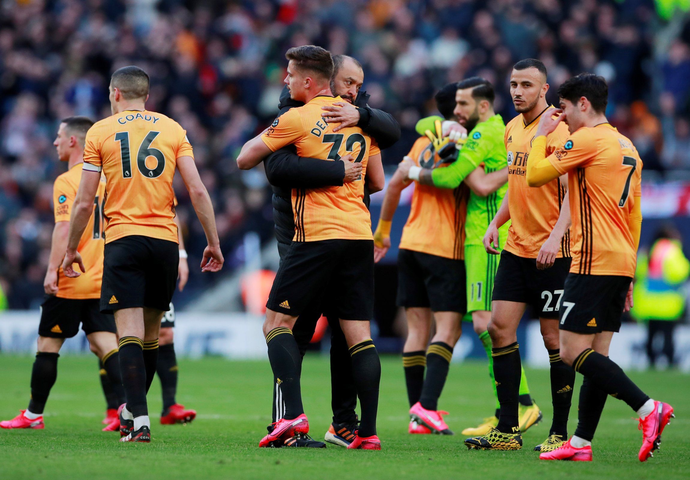 wolves players celebrate with manager nuno santo