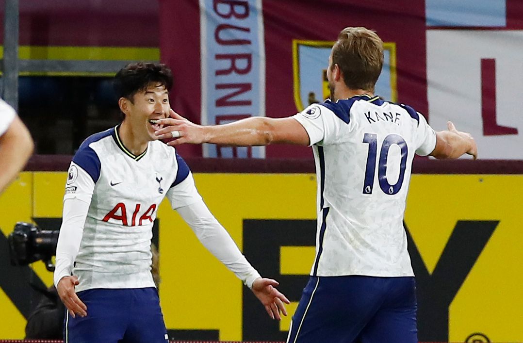 Soccer Football - Premier League - Burnley v Tottenham Hotspur - Turf Moor, Burnley, Britain - October 26, 2020 Tottenham Hotspur's Son Heung-min celebrates scoring their first goal with Harry Kane Pool via REUTERS/Jason Cairnduff EDITORIAL USE ONLY. No use with unauthorized audio, video, data, fixture lists, club/league logos or 'live' services. Online in-match use limited to 75 images, no video emulation. No use in betting, games or single club /league/player publications.  Please contact your