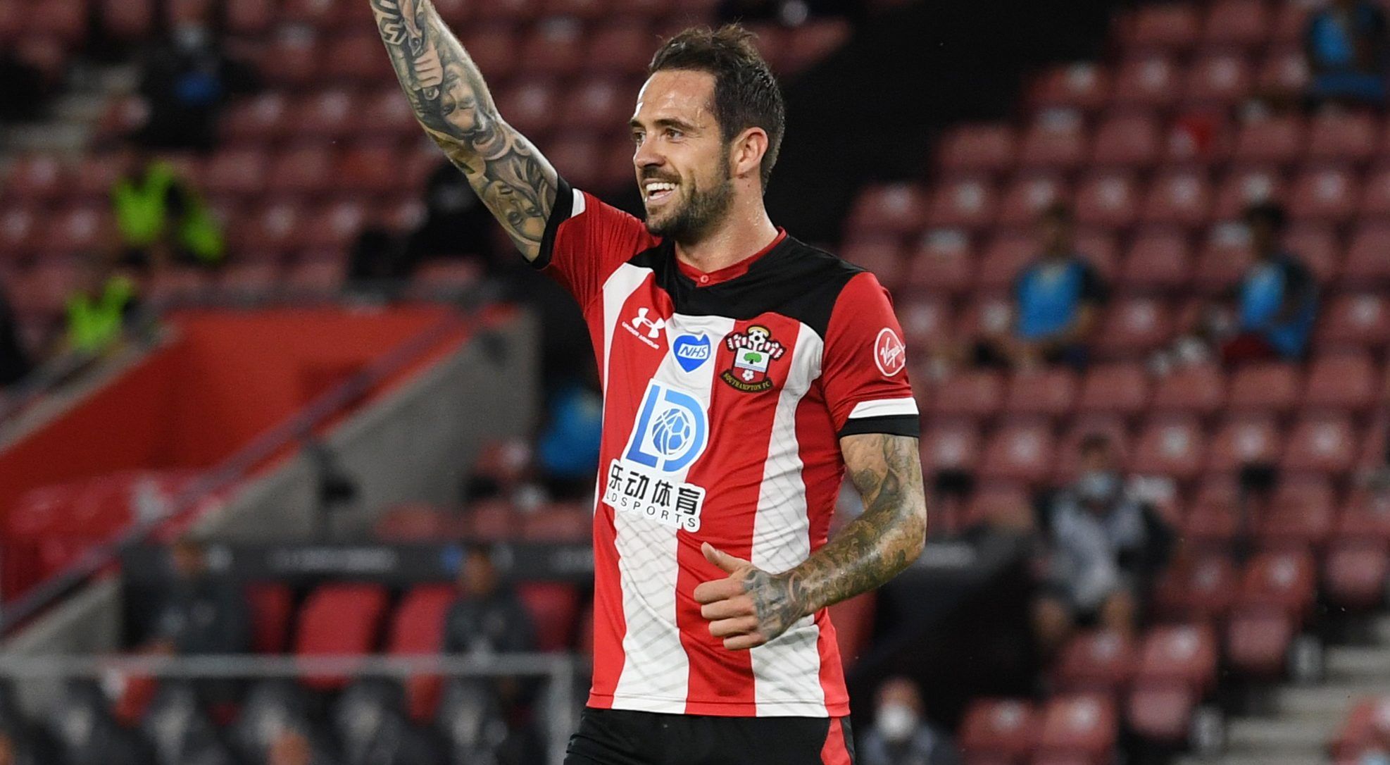 Soccer Football - Premier League - Southampton v Brighton &amp; Hove Albion - St Mary's Stadium, Southampton, Britain - July 16, 2020 Southampton's Danny Ings celebrates scoring their first goal, as play resumes behind closed doors following the outbreak of the coronavirus disease (COVID-19) Pool via REUTERS/Neil Hall EDITORIAL USE ONLY. No use with unauthorized audio, video, data, fixture lists, club/league logos or 'live' services. Online in-match use limited to 75 images, no video emulation. 