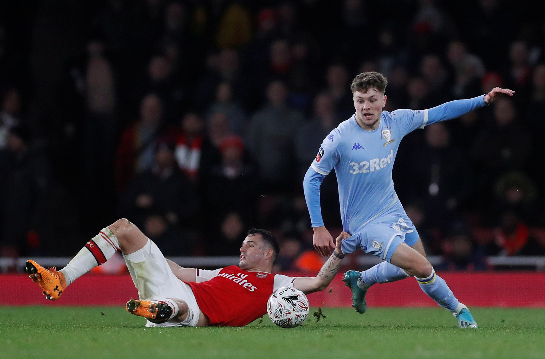 Soccer Football - FA Cup - Third Round - Arsenal v Leeds United - Emirates Stadium, London, Britain - January 6, 2020   Arsenal's Granit Xhaka in action with Leeds United's Jordan Stevens   Action Images via Reuters/Matthew Childs