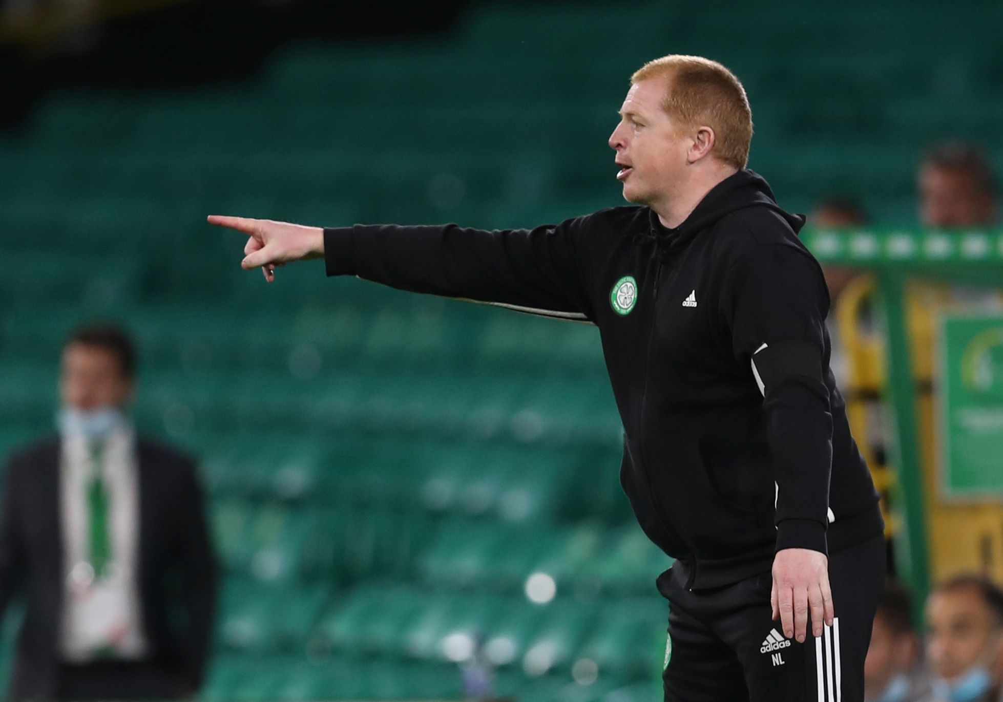 Soccer Football - Champions League - Second Qualifying Round - Celtic v Ferencvaros - Celtic Park, Glasgow, Scotland, Britain - August 26, 2020  Celtic manager Neil Lennon reacts during the match, as play resumes behind closed doors following the outbreak of the coronavirus disease (COVID-19)  REUTERS/Russell Cheyne/Pool