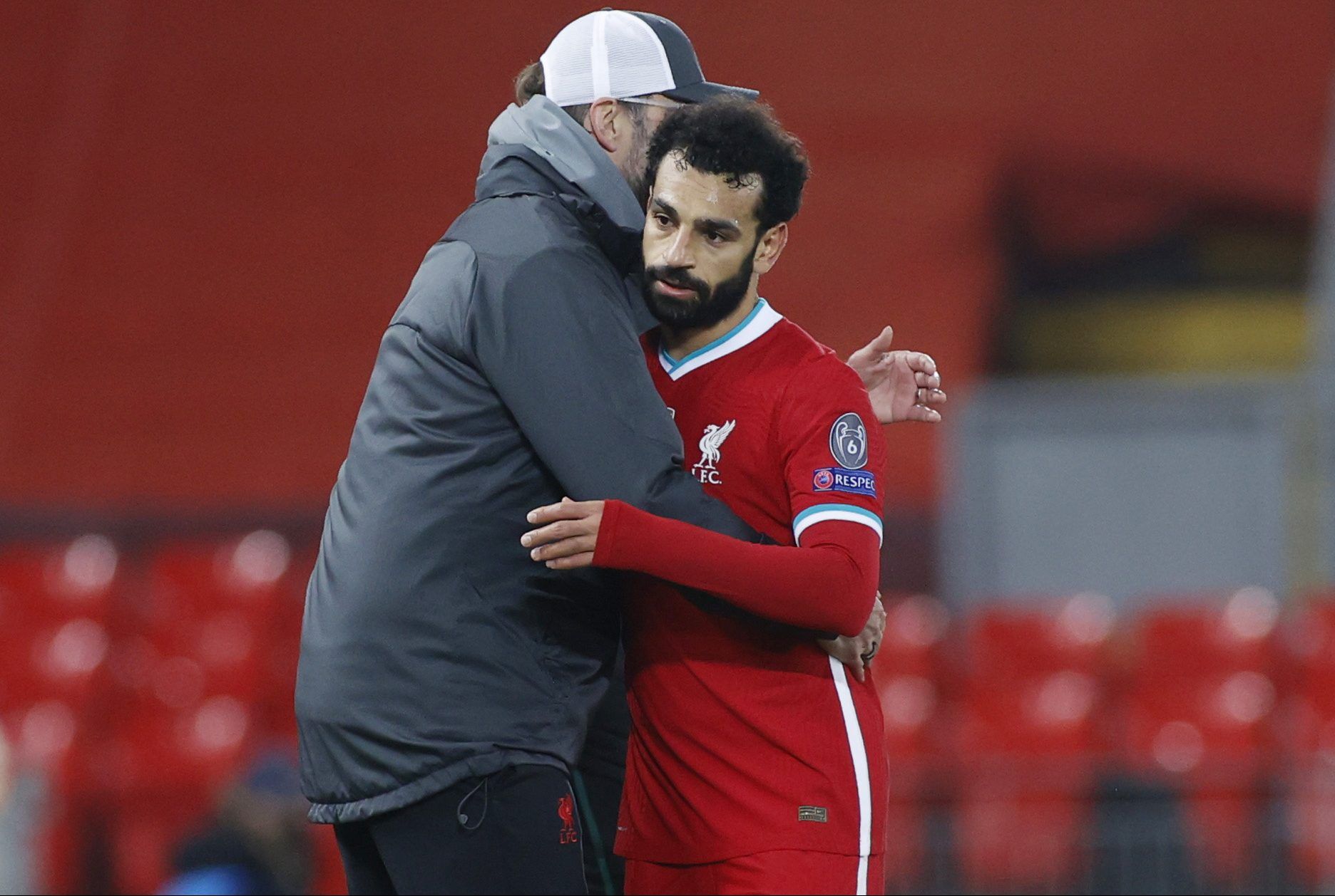 Soccer Football - Champions League - Group D - Liverpool v Ajax Amsterdam - Anfield, Liverpool, Britain - December 1, 2020  Liverpool's Mohamed Salah with manager Juergen Klopp as he walks off to be substituted Pool via REUTERS/Phil Noble