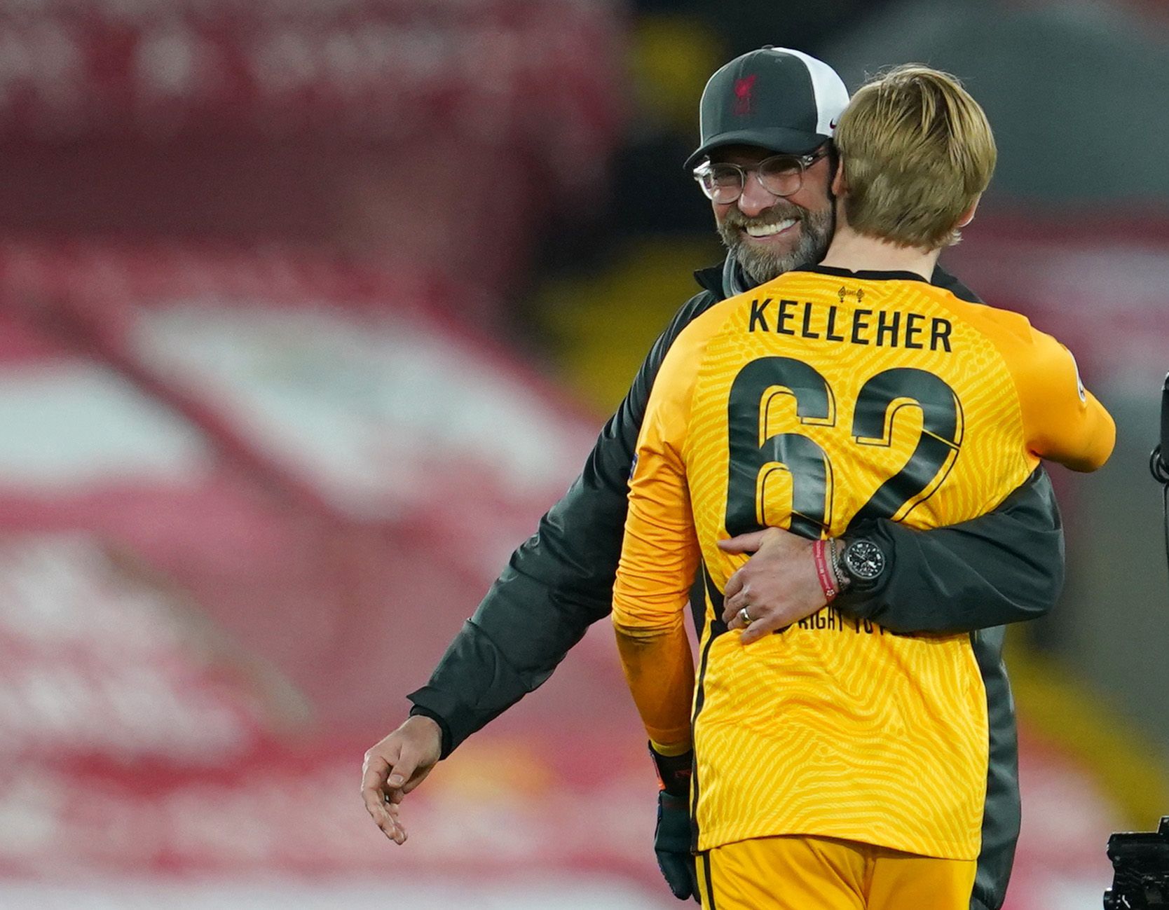 Soccer Football - Champions League - Group D - Liverpool v Ajax Amsterdam - Anfield, Liverpool, Britain - December 1, 2020  Liverpool manager Juergen Klopp celebrates with Caoimhin Kelleher after the match Pool via REUTERS/Jon Super