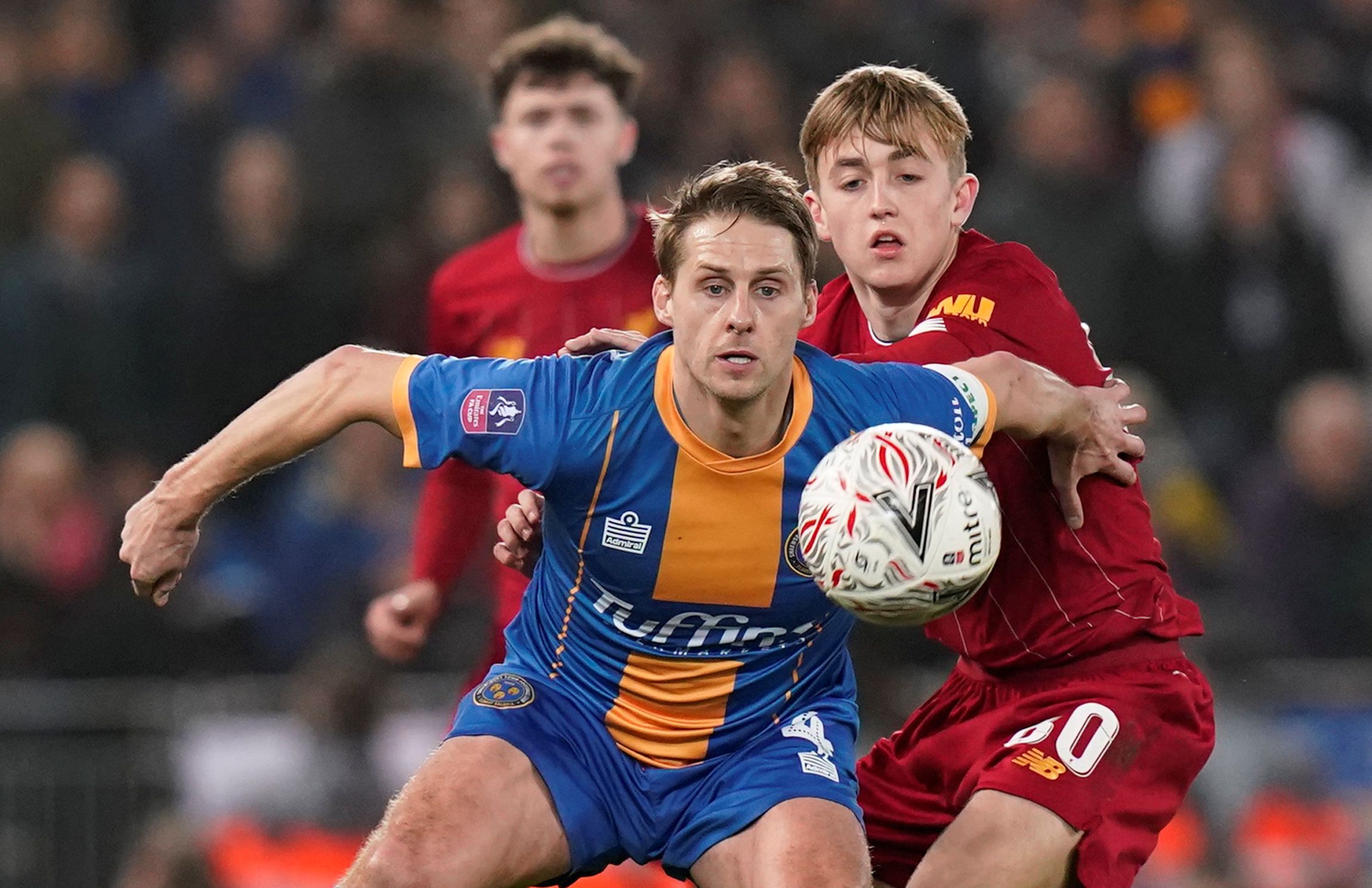 Soccer Football -  FA Cup Fourth Round Replay - Liverpool v Shrewsbury Town  - Anfield, Liverpool, Britain - February 4, 2020  Shrewsbury Town's David Edwards in action with Liverpool's Jake Cain        REUTERS/Andrew Yates