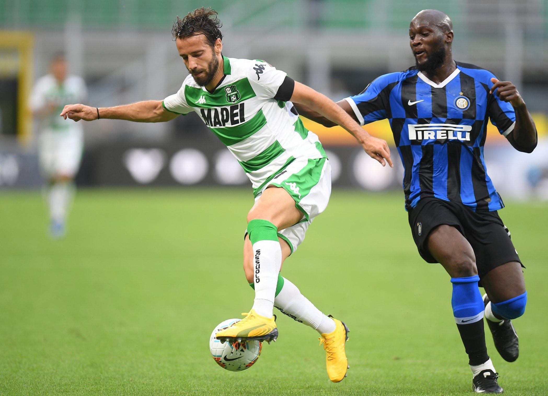 sassuolo centre-back gian marco ferrari in action vs inter striker romelu lukaku spurs transfer target rumours